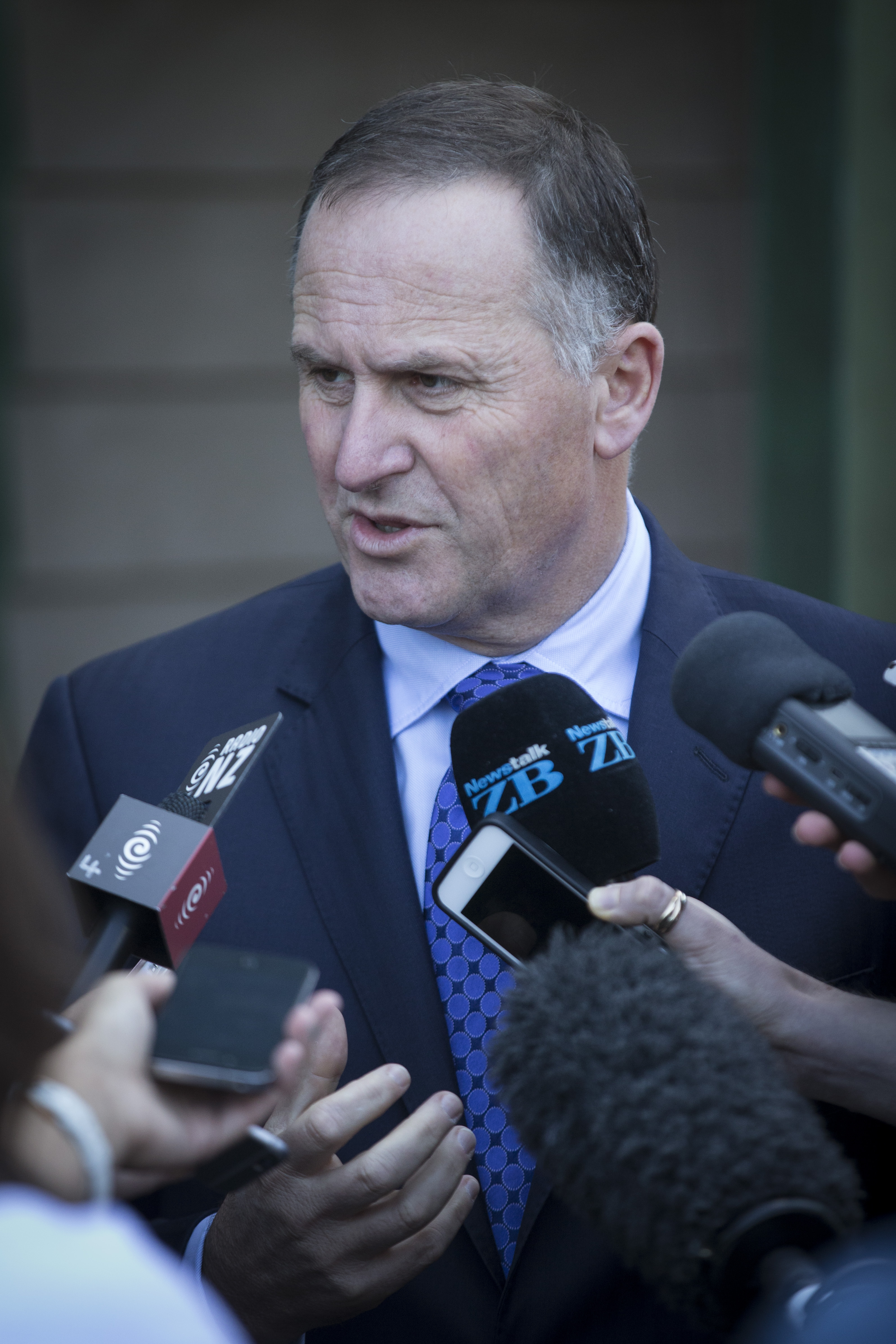 Prime Minister John Key speaks to the media outside the Air New Zealand offices in Westhaven. 5 November 2015 New Zealand Herald photograph by Jason Oxenham WAG 11Nov15 - RGP 11Nov15 - WGP 11