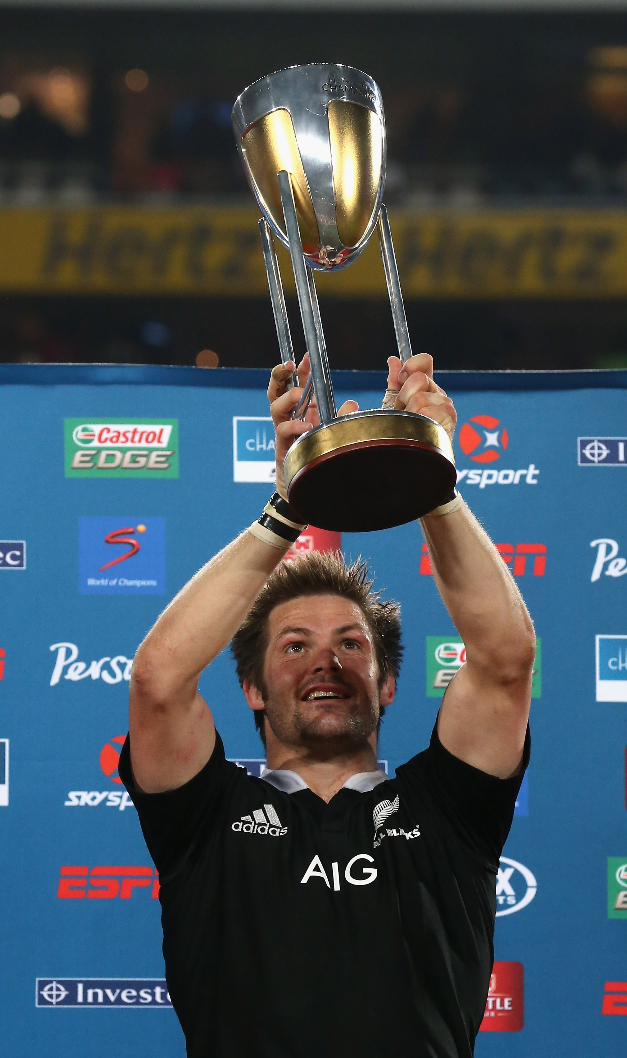 All Blacks captain Richie McCaw raises the trophy after winning the Rugby Championship. Photo / Getty Images