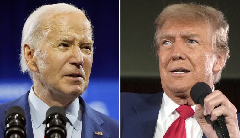 Donald Trump, right, has a small polling lead over Joe Biden in the critical swing states. Photo / AP