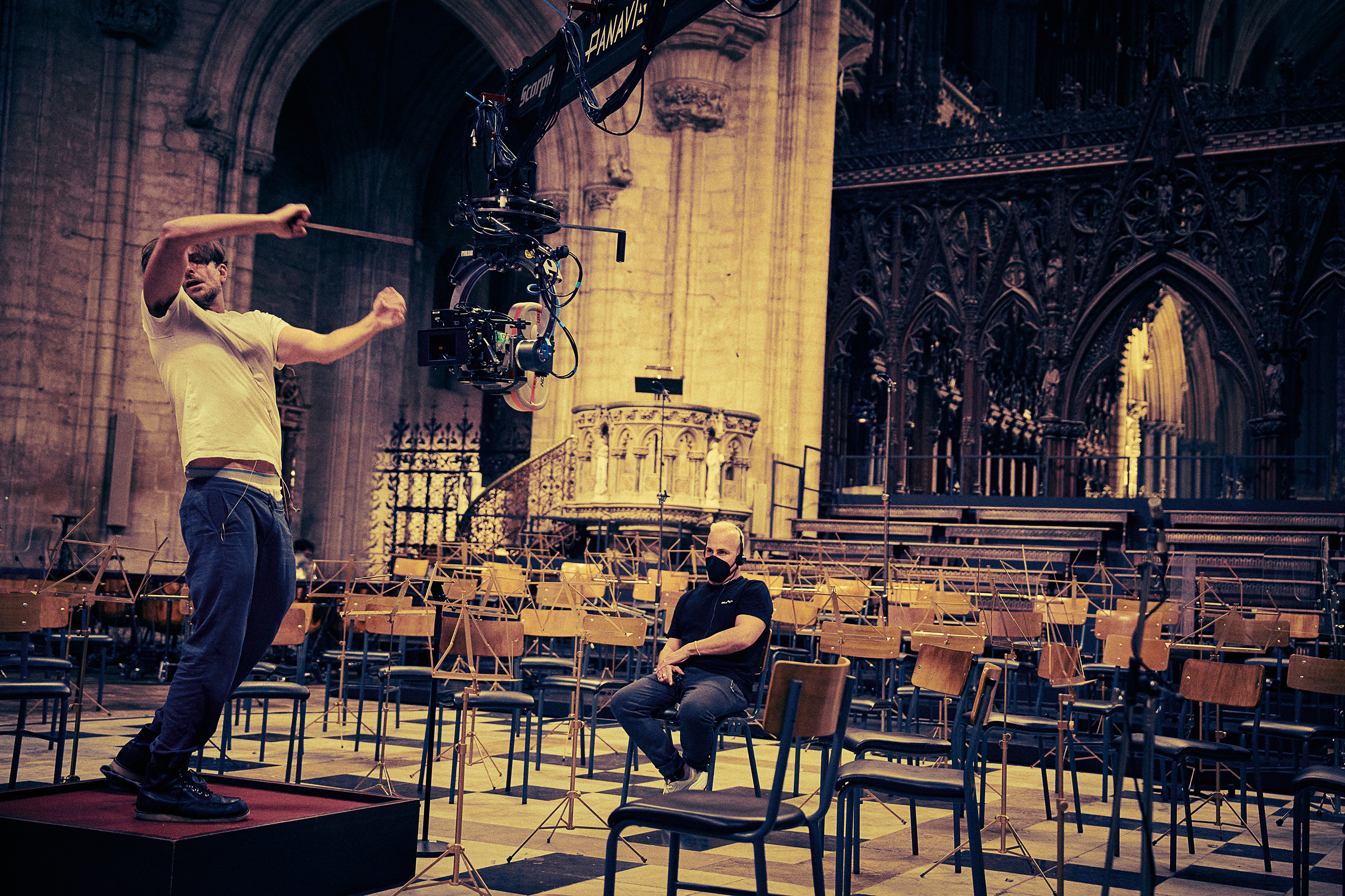 Cooper with Yannick Nezet-Seguin at Ely Cathedral, in England, where Nezet-Seguin coached Cooper for the film’s re-creation of a performance of Mahler’s Resurrection Symphony with the London Symphony Orchestra. Photo / Jason McDonald, Netflix