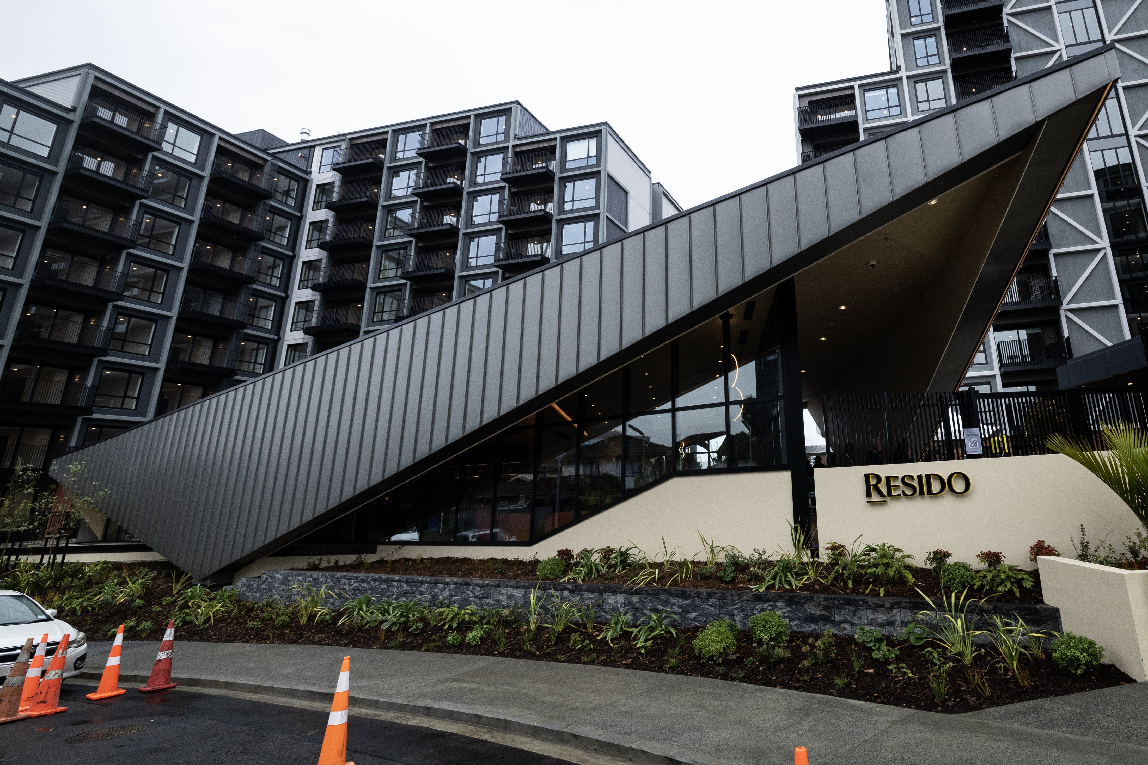 The eye-catching common area outside the three-tower Resido apartments, opened by Prime Minister Christopher Luxon. Photo / Jason Oxenham