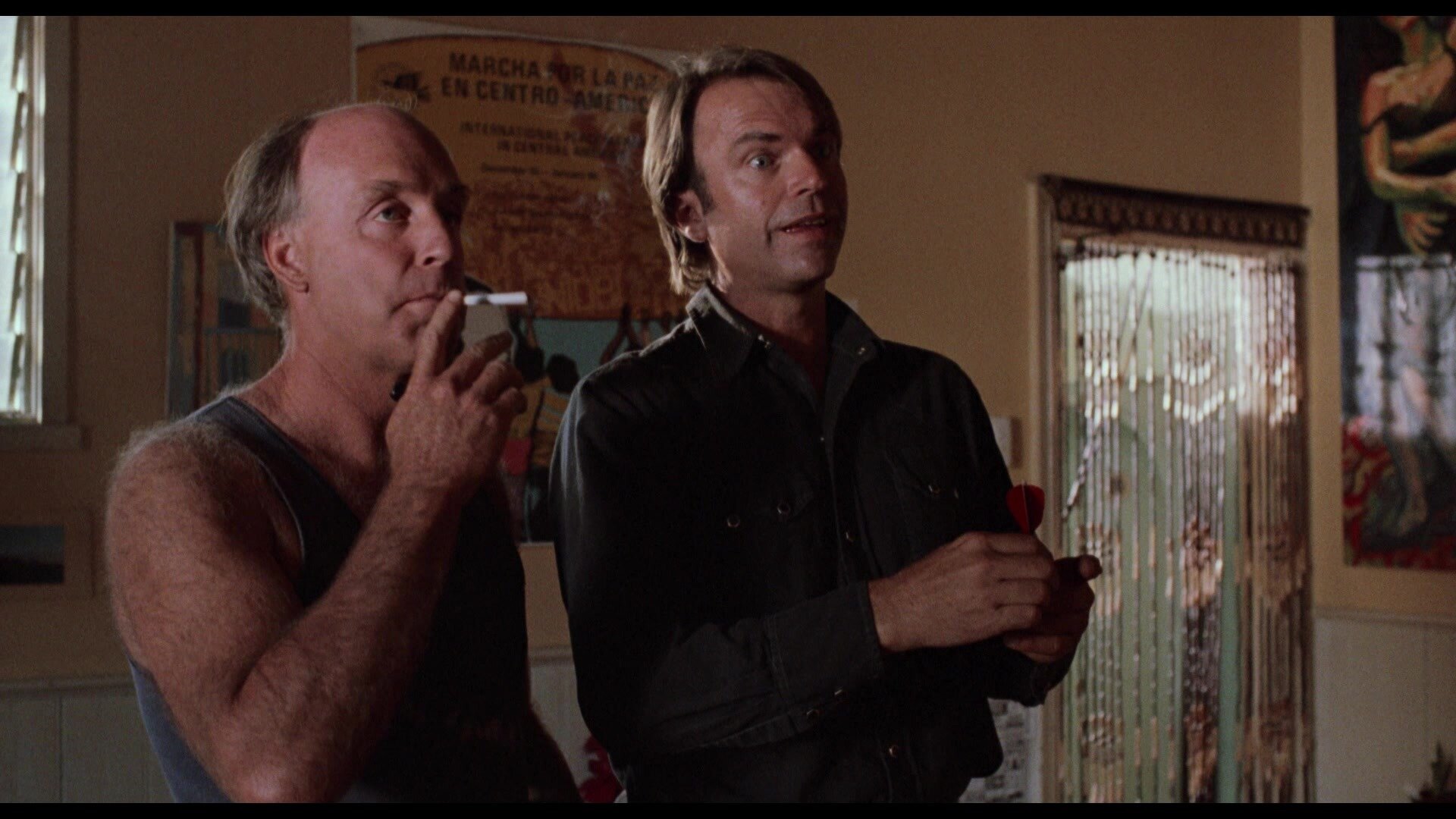  John Clarke and Sam Neill in the 1990 black comedy Death in Brunswick, which is set in Melbourne.
