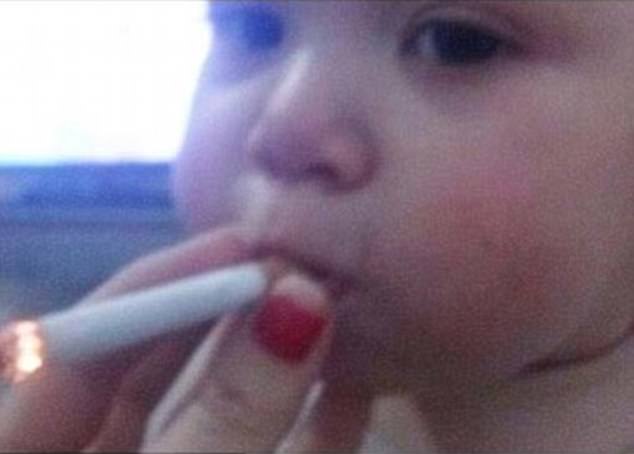bebe cigarette Baby smoking a cigarette' photo sparks global outrage - again