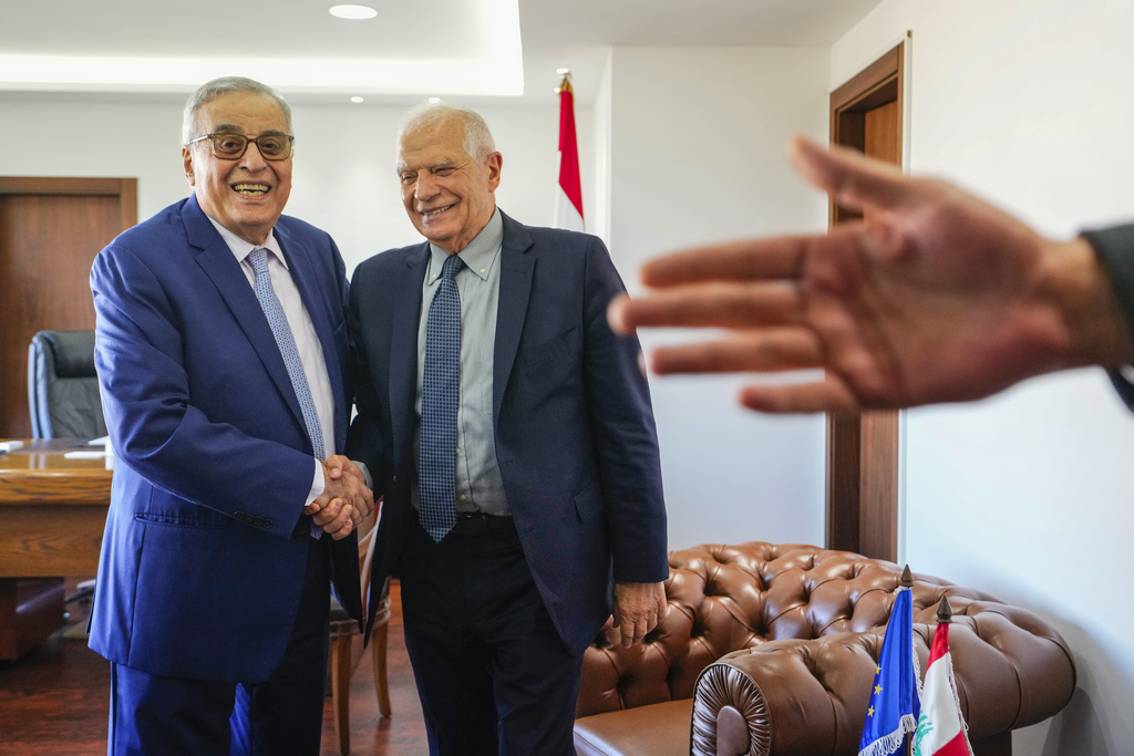 Lebanese Foreign Minister Abdallah Bouhabib, left, shakes hands with European Union foreign policy chief Josep Borrell before their meeting in Beirut, Lebanon on January 6. Photo / AP
