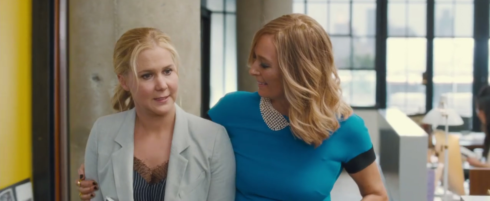 Amy Schumer and Tilda Swinton in a scene from the movie Trainwreck.