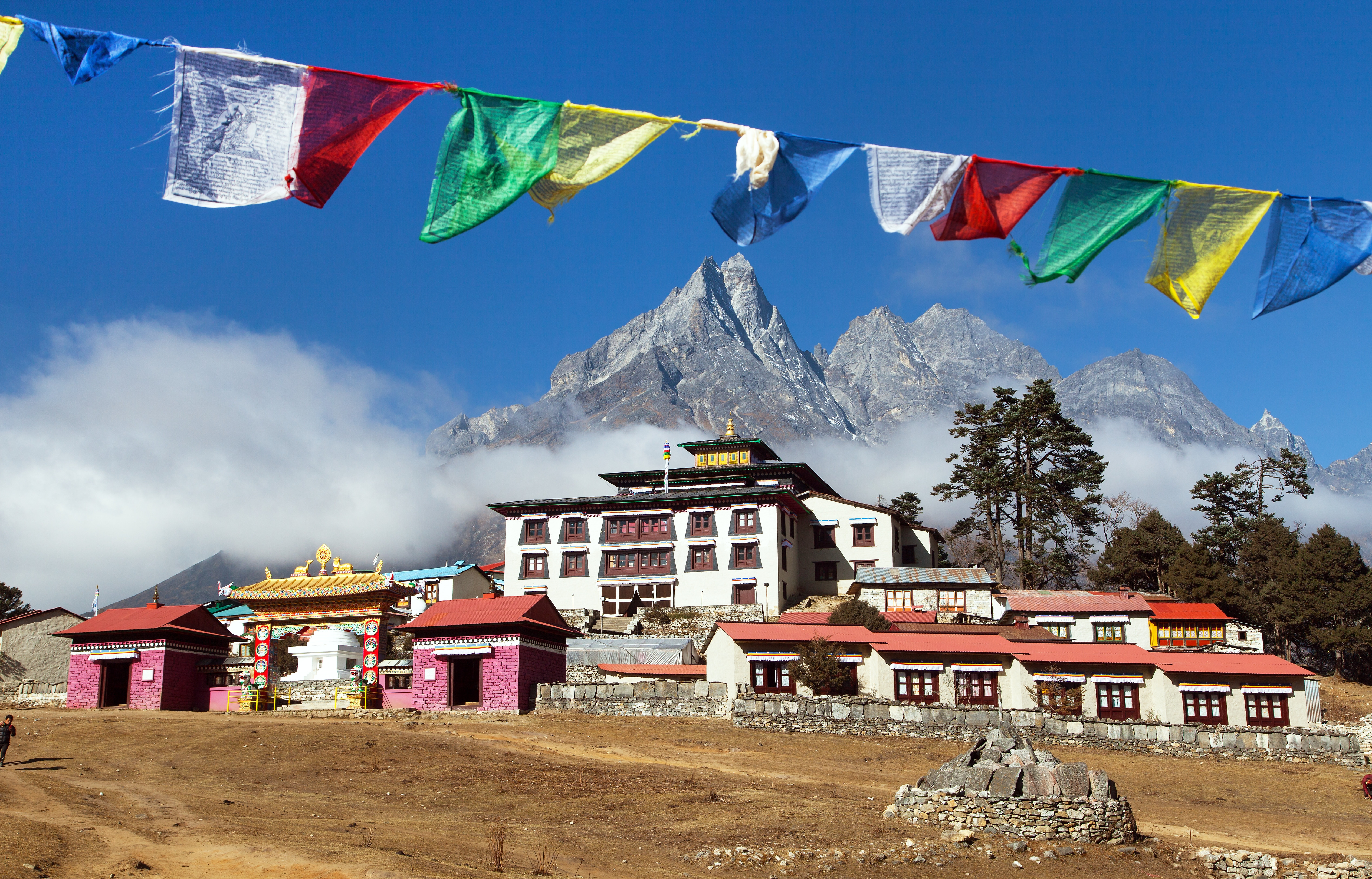 Prayer flags and Buddhist monasteries on the way to Everest Base Camp. Photo / 123rf