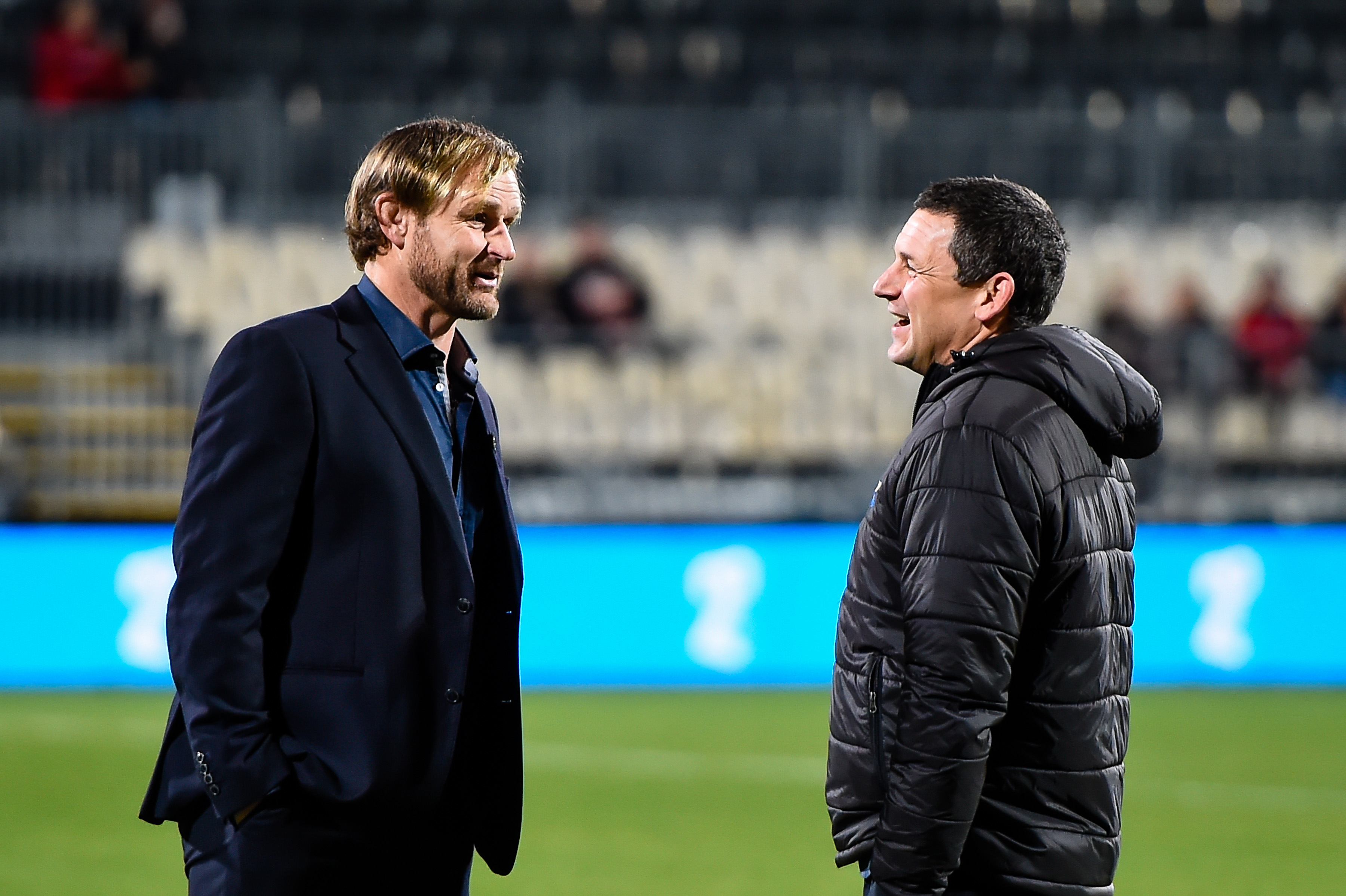 Crusaders coach Scott Robertson with Hurricanes coach Jason Holland. Photo / Photosport