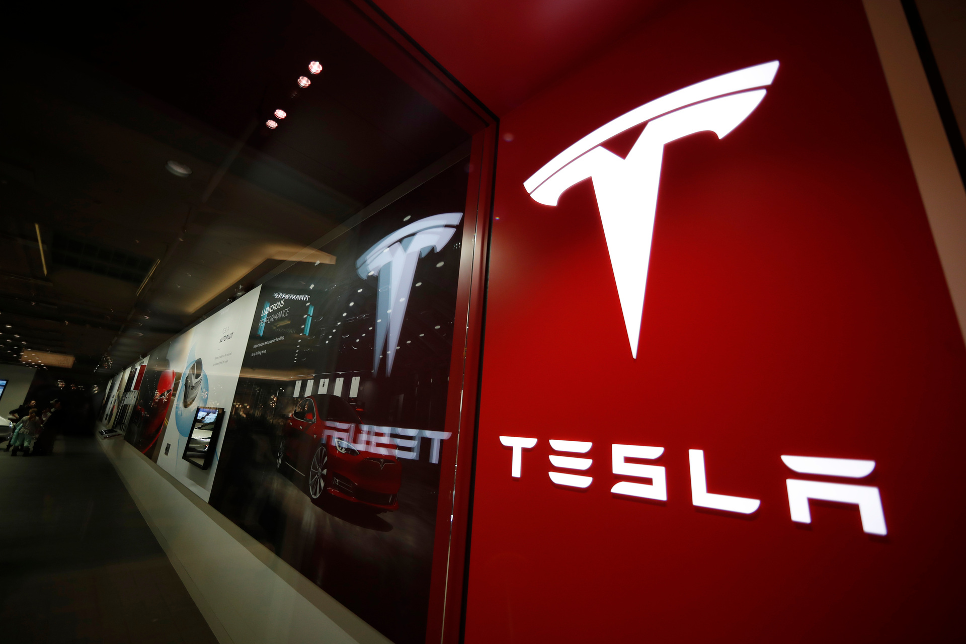 Tesla executives said the company will use innovative manufacturing techniques and smaller factories to cut the cost of its next generation of vehicles. Photo / AP