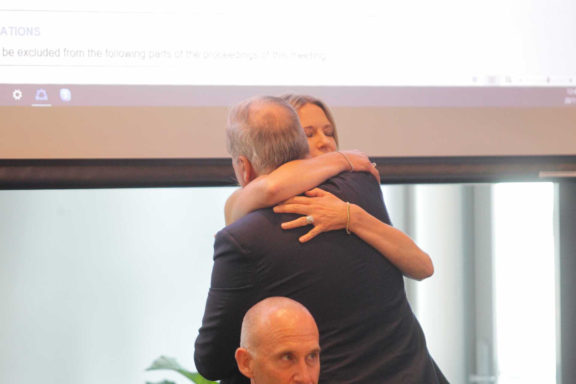 Tenby Powell shares a hug with wife Sharon Hunter moments after his resignation speech in council chambers. Photo / George Novak