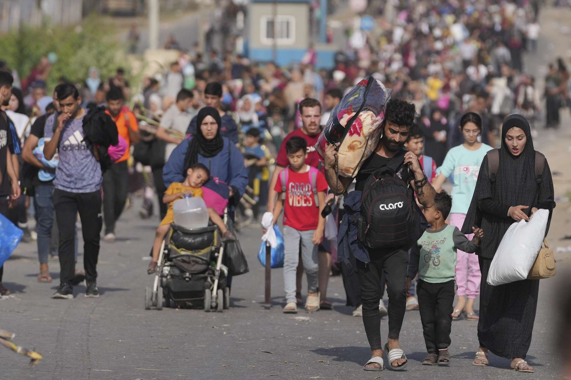 Palestinians were seen fleeing to the southern Gaza Strip on Salah al-Din Street in Bureij, Gaza Strip, earlier this week. Photo / AP