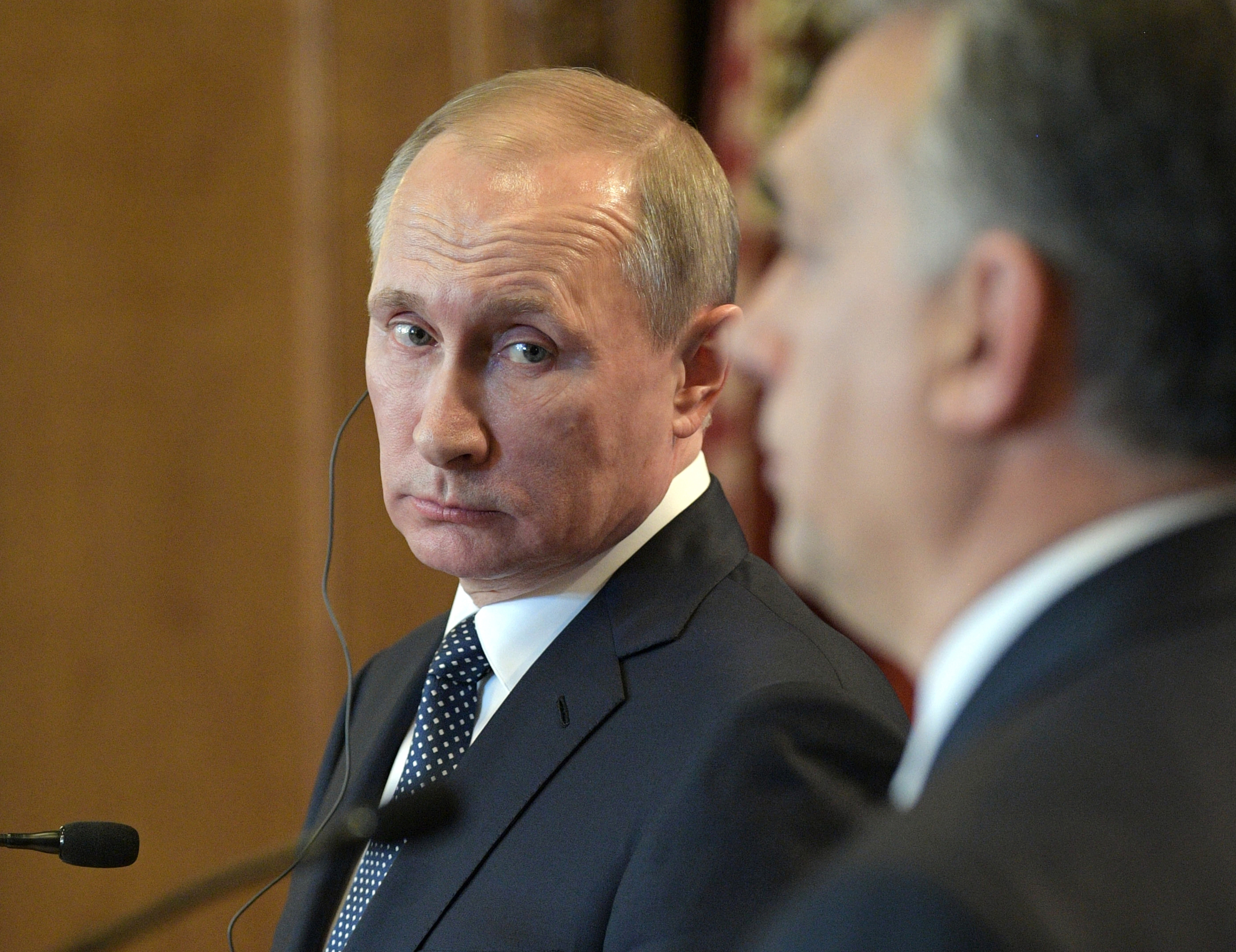 Russian President Vladimir Putin is linked to the assassinations of at least 10 politicians, journalists and lawyers critical of his government. Photo / AP