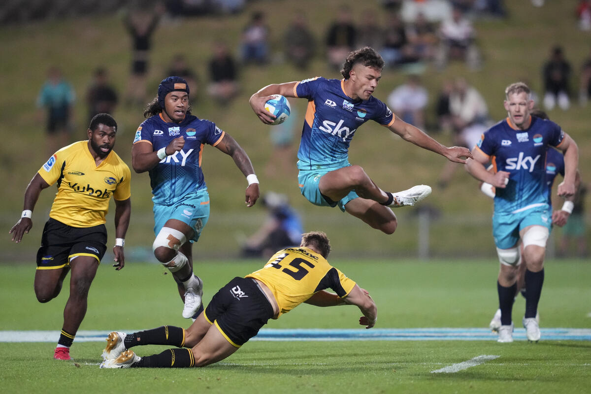 Moana Pasifika's Kyren Taumoefolau makes a break during his side's Super Rugby Pacific match against the Hurricanes at North Harbour Stadium on Saturday, March 8. Photo / Michael Thomas / action press