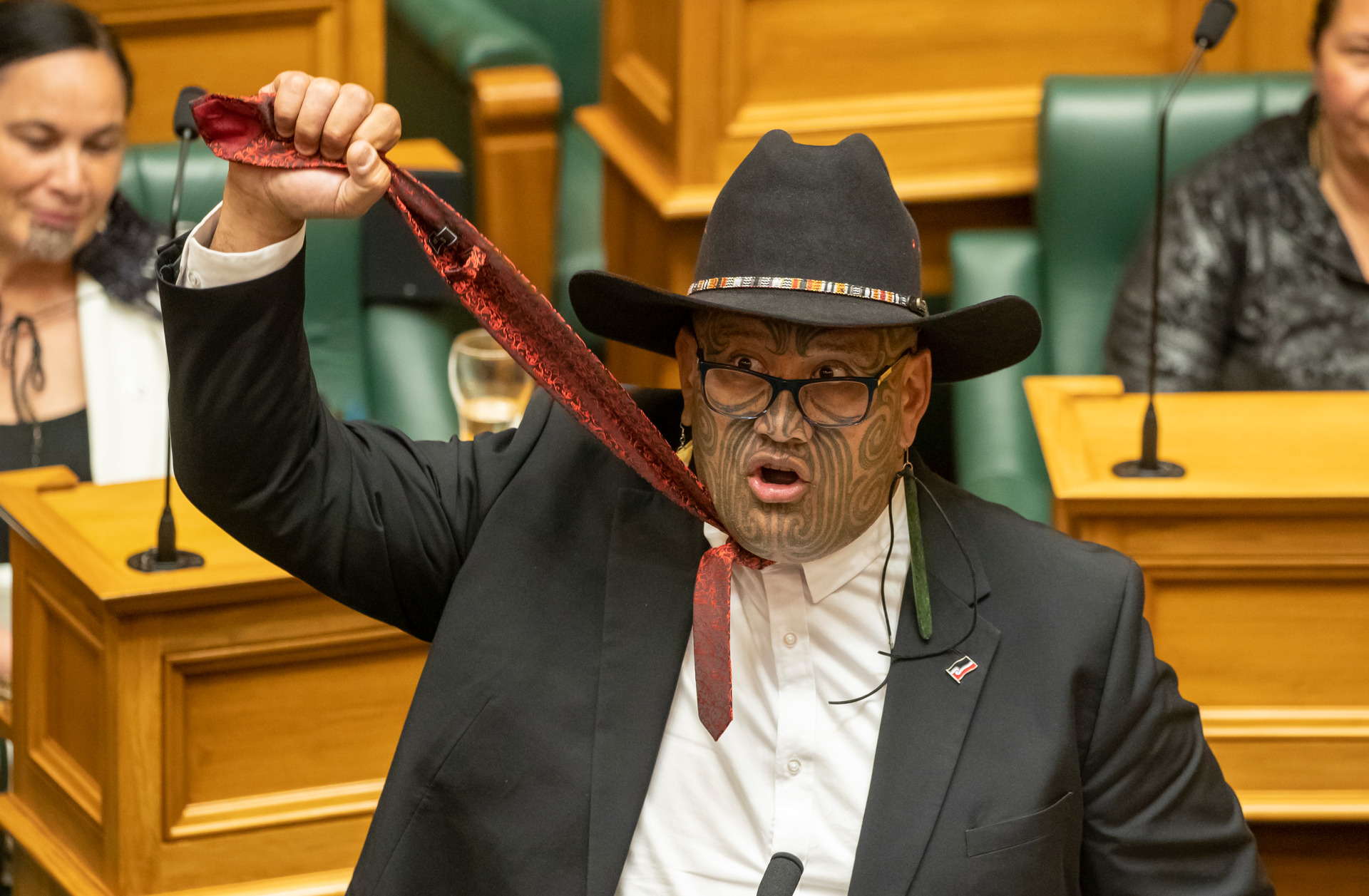 Te Pāti Māori co-leader Rawiri Waititi holding his tie aloft to symbolise a noose during his maiden speech in Parliament in December 2020. Photo / Mark Mitchell