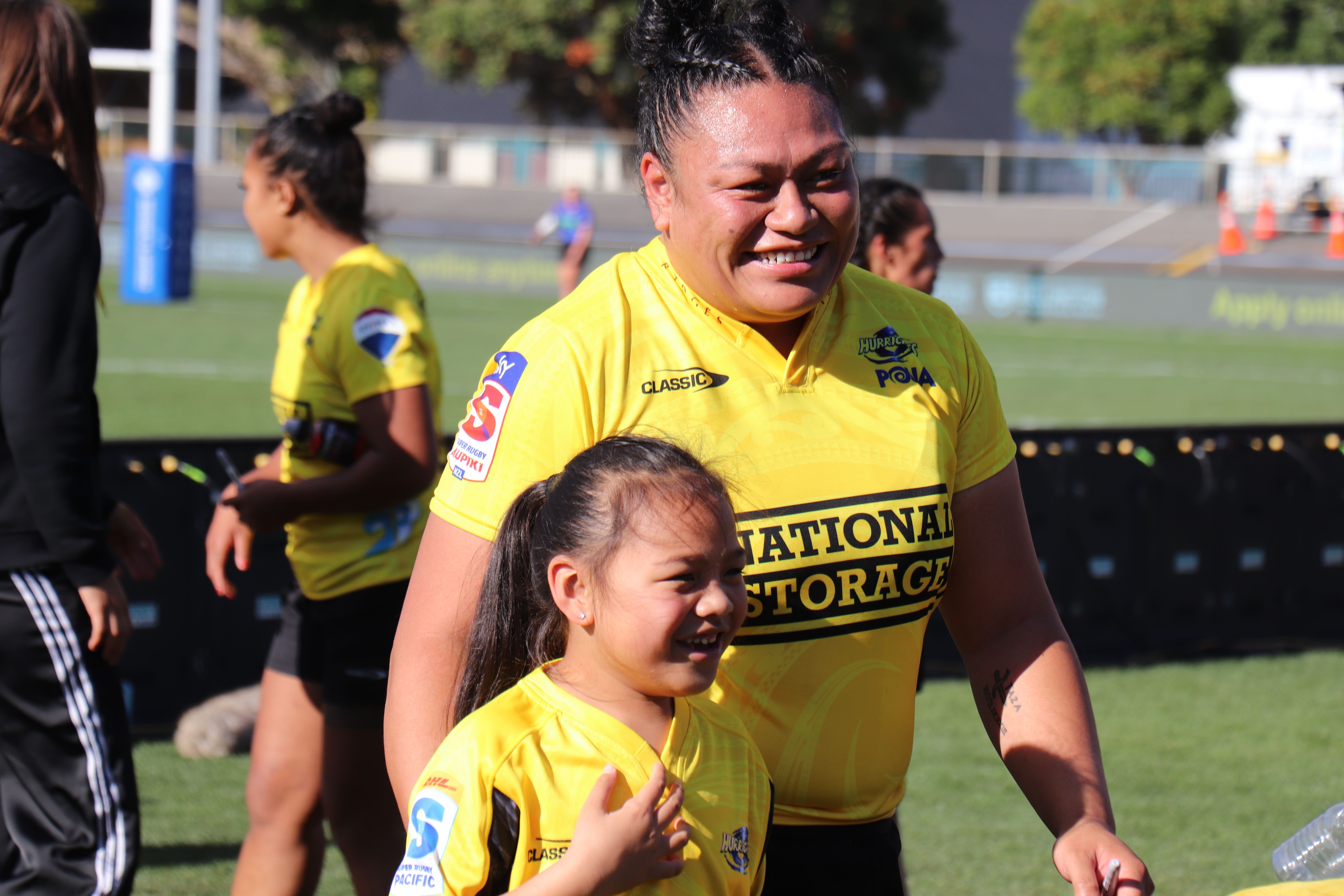 Hurricanes Poua forward Tori Iosefo with her daughter Cataleya after the match at Levin Domain against the Blues.