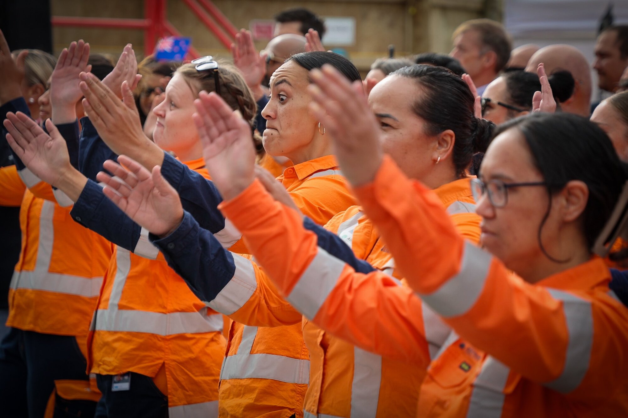 Watercare workers perform a haka as Hiwa-i-te-Rangi breaks through. Photo / Michael Craig
