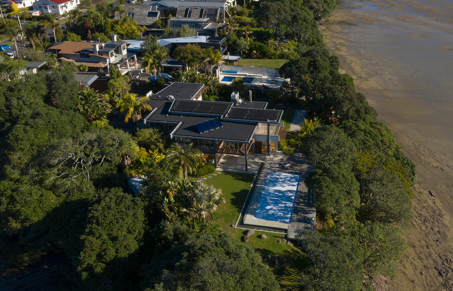 A helipad is sought on glass by the sea at this Westmere property. Photo / Brett Phibbs