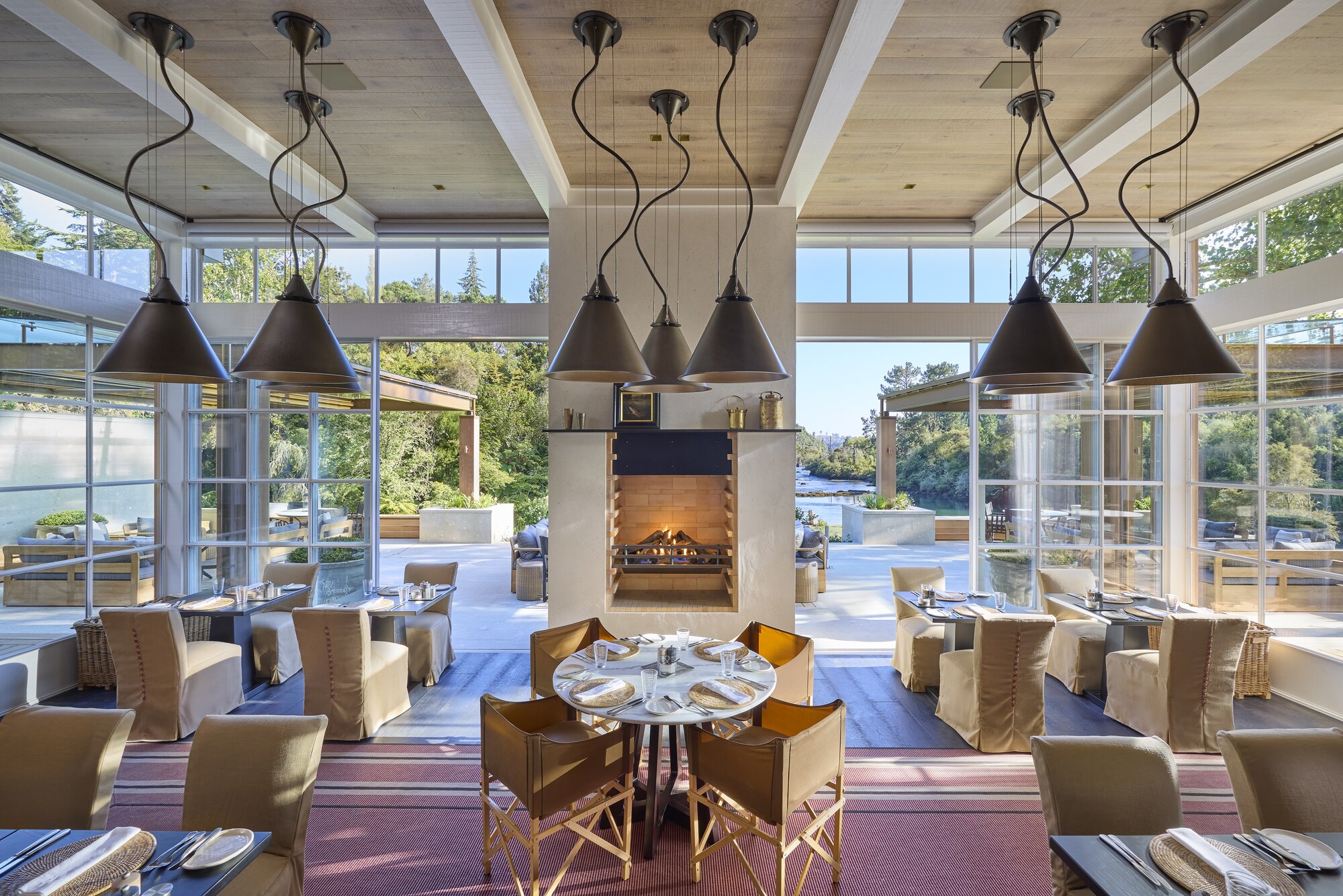 The new and improved dining room has a seamless connection to the outdoors. Photo / George Apostolidis