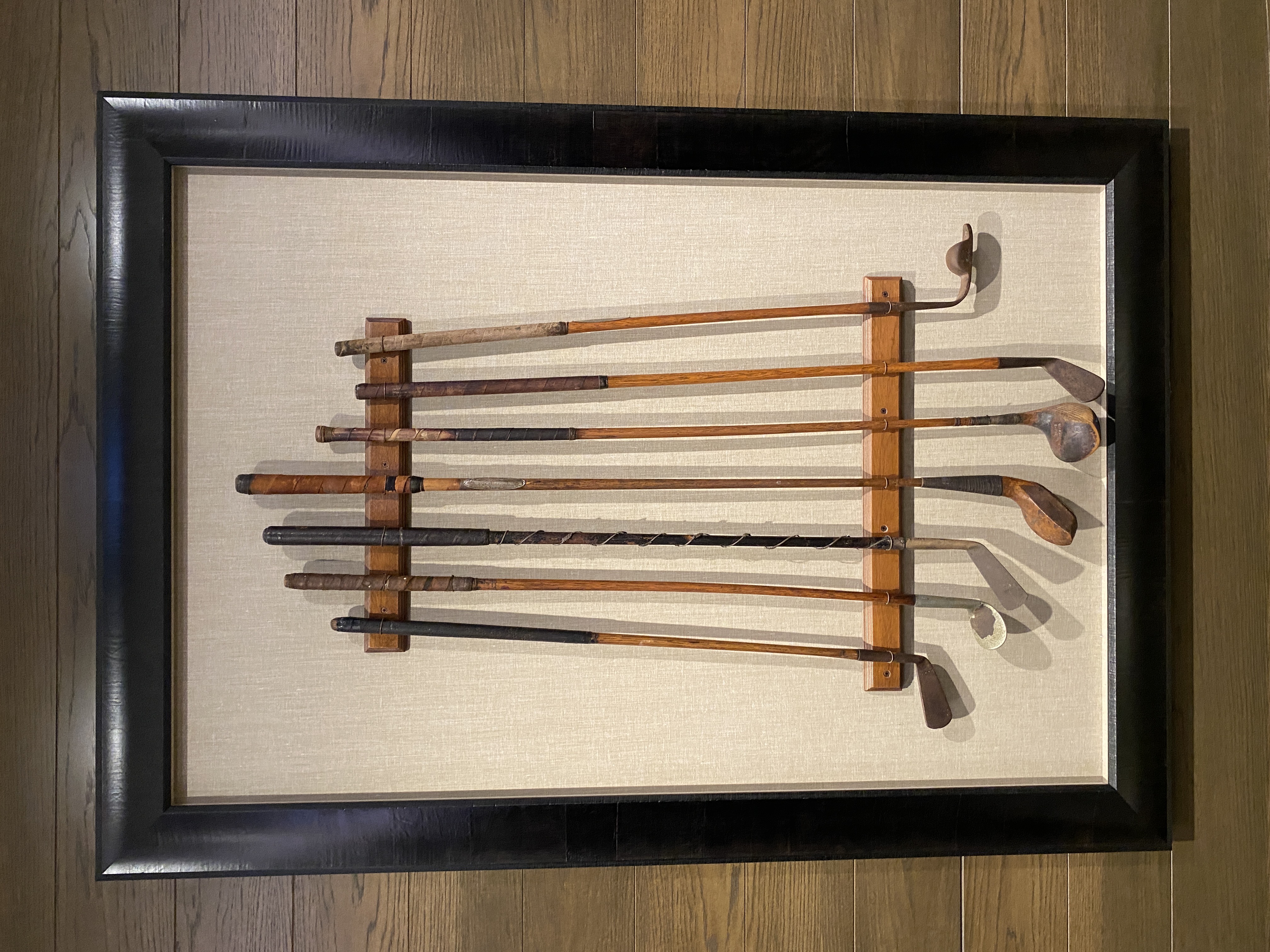 A set of old clubs greet you in the men's changing room at Royal Auckland and Grange Golf Club.