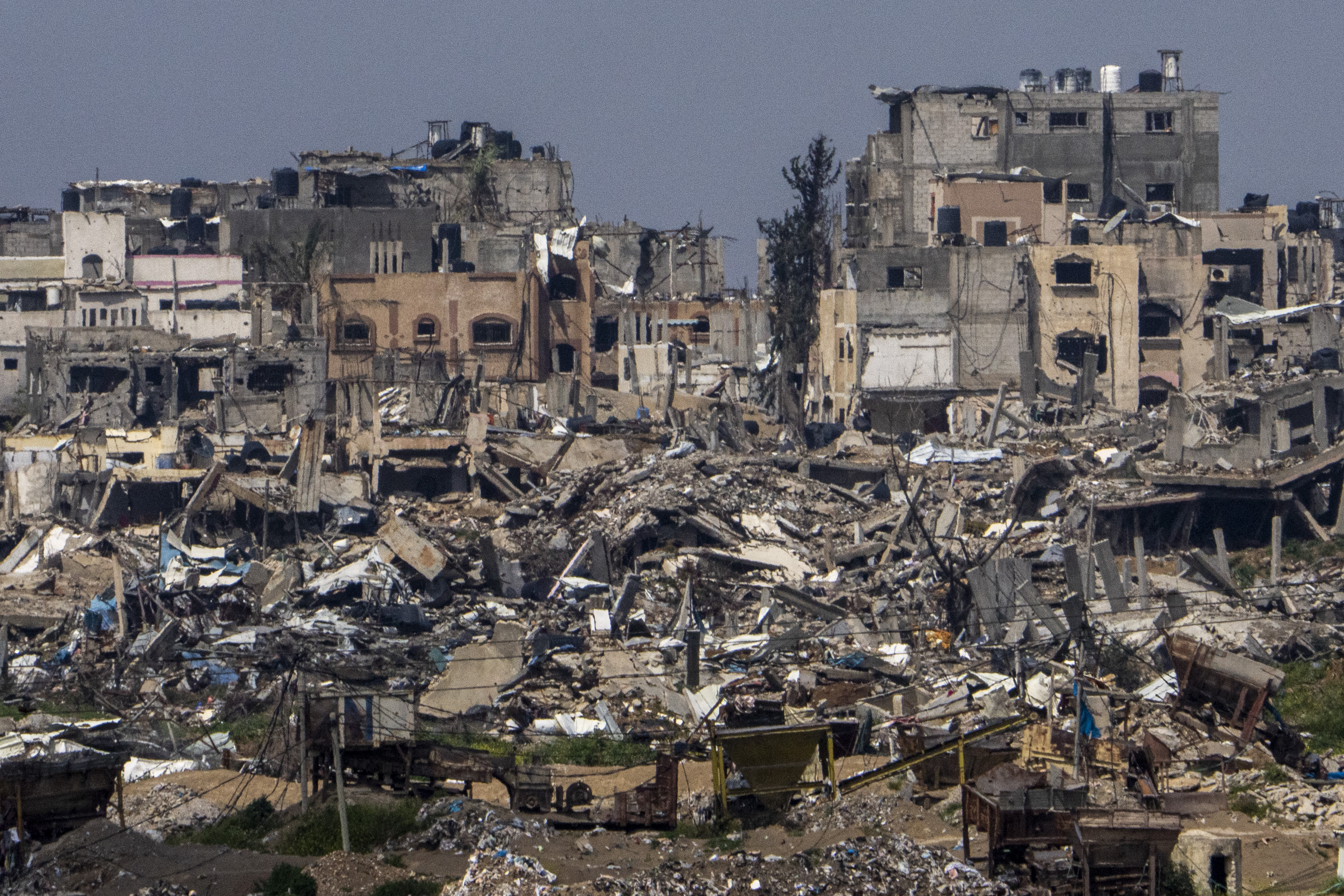 Destroyed buildings stand inside Gaza Strip, as seen from southern Israel, Tuesday, March 19, 2024. Photo / AP