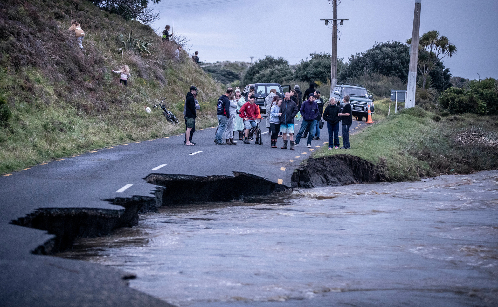 Bethells Road washes out cutting off residents from Erangi Place. Photo / Michael Craig