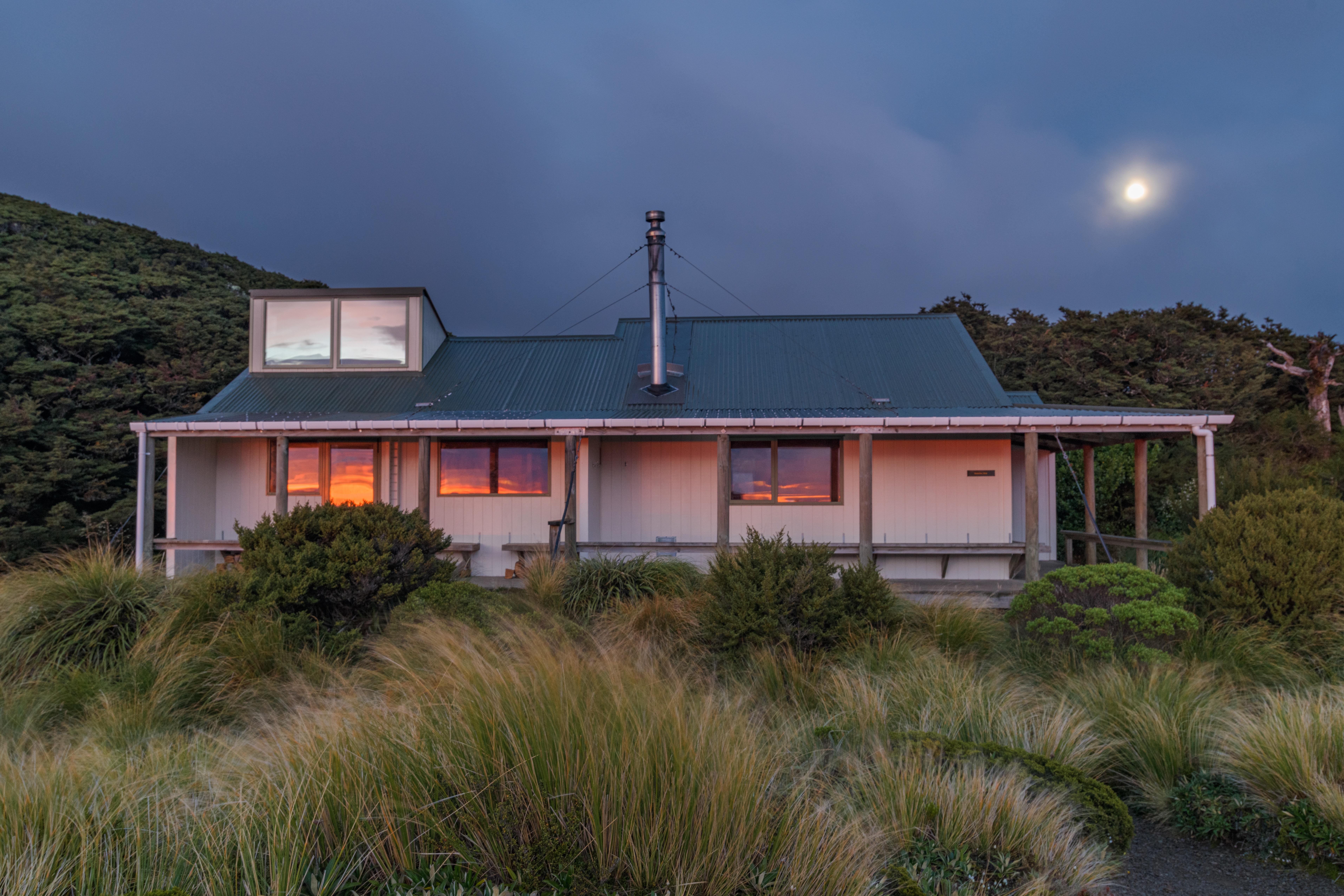Dawn and moon at Sunrise Hut, Ruahine Forest Parl, Hawke's Bay. Photo / Shaun Barnett