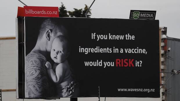 The billboard sporting an anti-vaccination message is located by the Auckland Southern Motorway near the Princes St off-ramp near Middlemore Hospital. Photo / Brett Phibbs