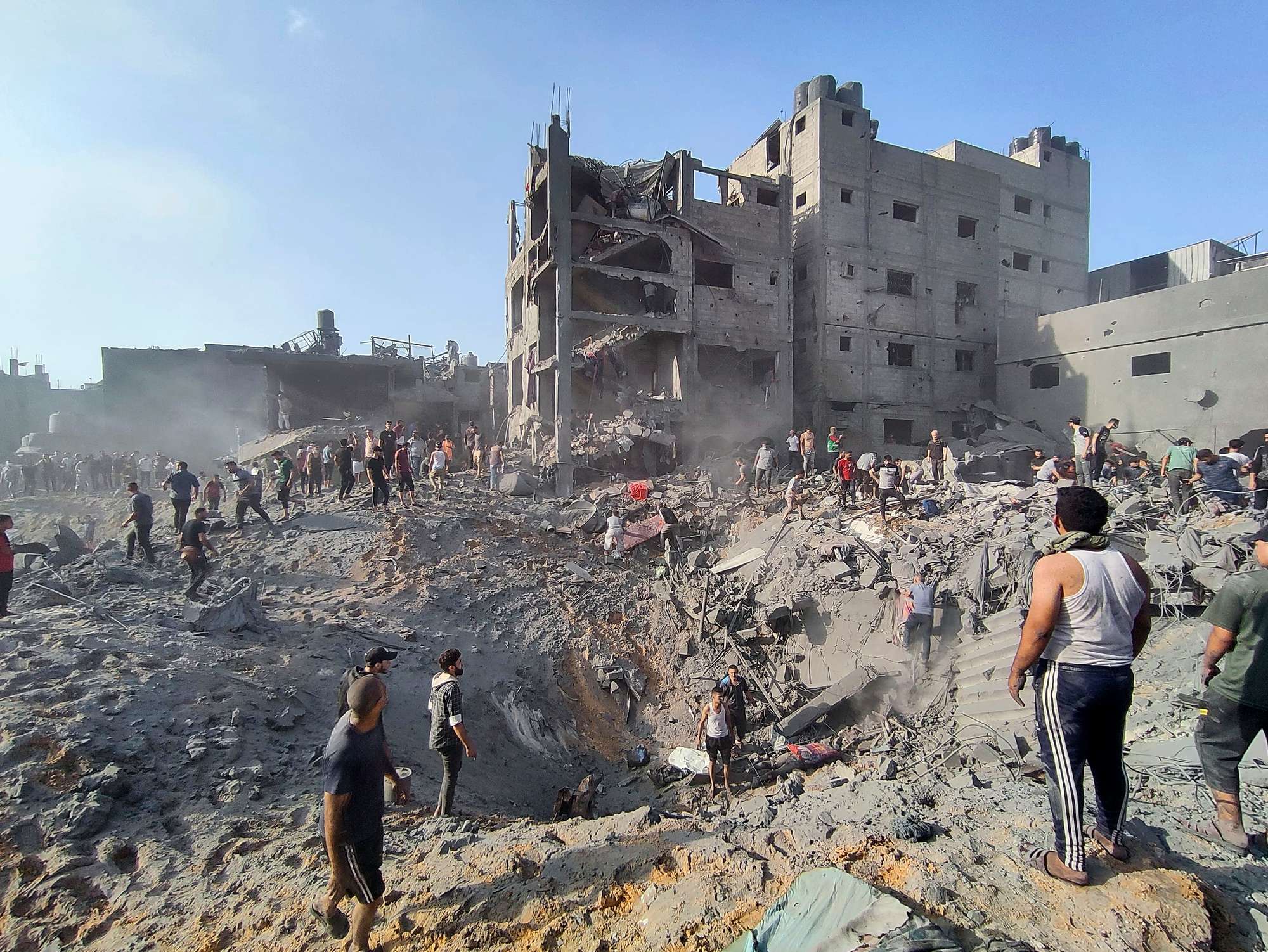 Palestinians inspect the damage of buildings destroyed by Israeli airstrikes on Jabaliya refugee camp on the outskirts of Gaza City. Photo / AP