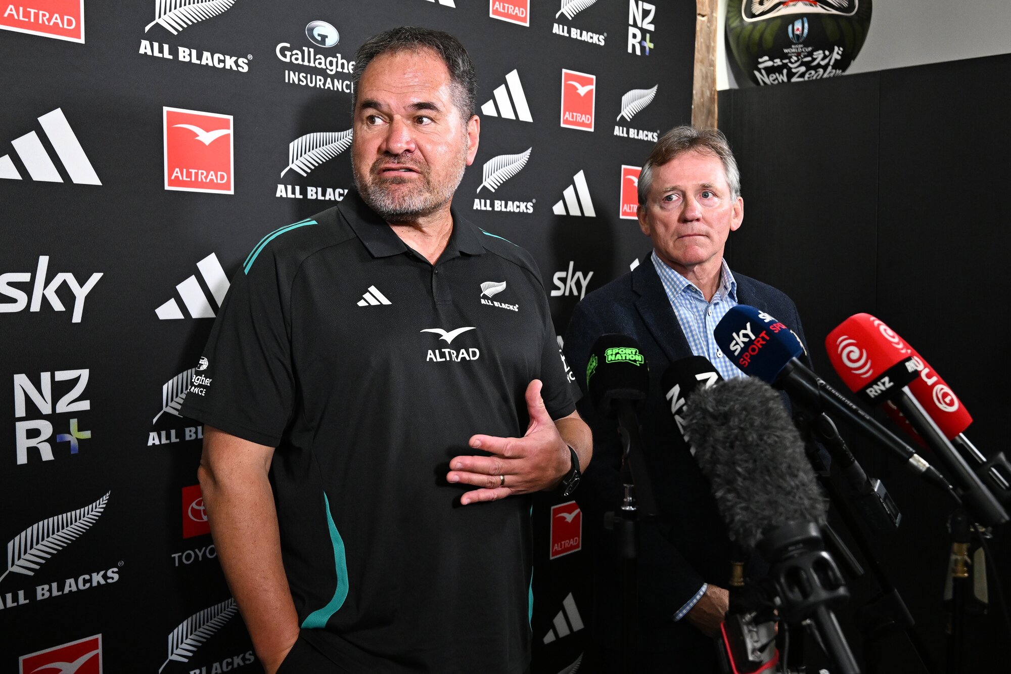 All Blacks coach Dave Rennie speaks to the media as New Zealand Rugby chair David Kirk looks on. Photo / Photosport