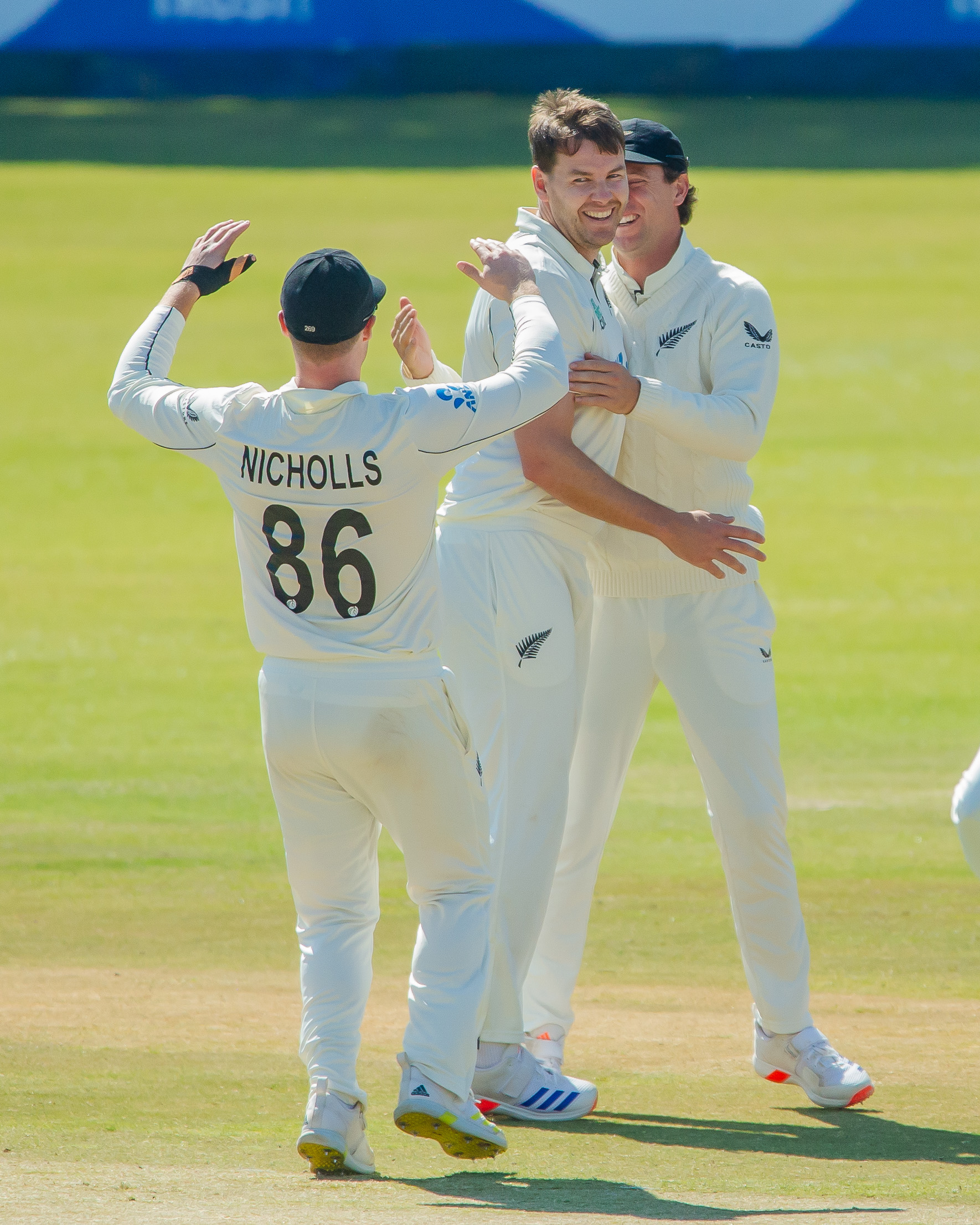 The Black Caps celebrate Jacob Duffy's maiden test wicket on day three of the second test against Zimbabwe. Photo / Zimbabwe Cricket