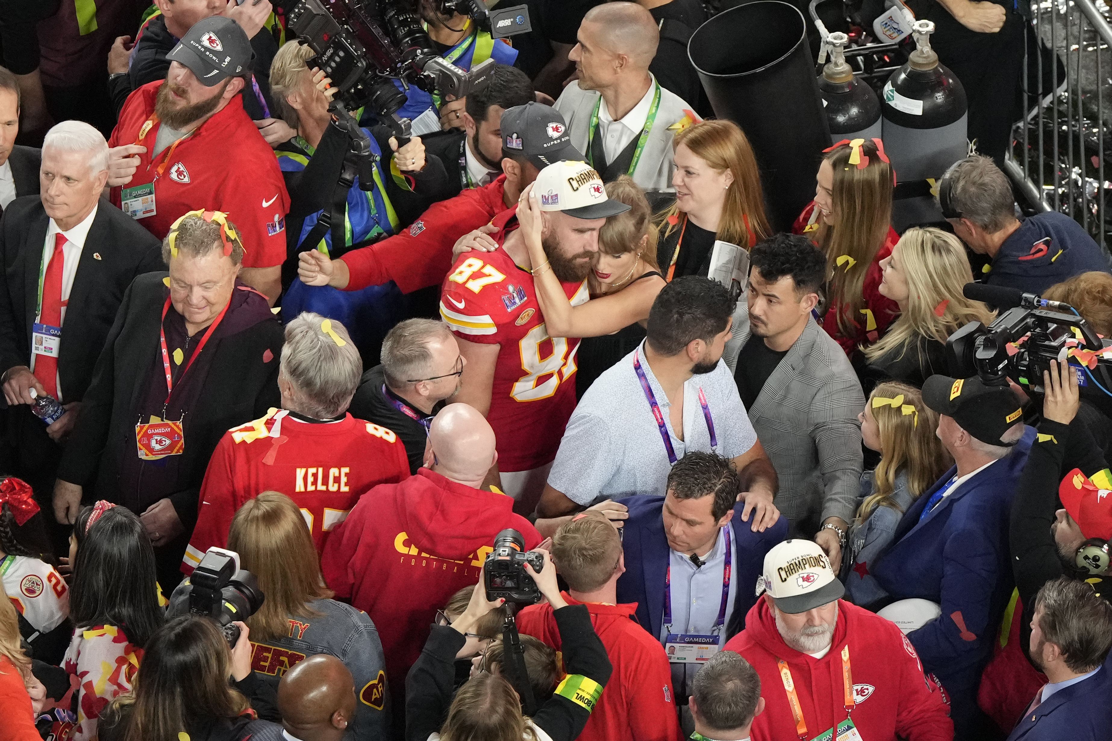 Kansas City Chiefs tight end Travis Kelce (87) hugs his girlfriend Taylor Swift after the team's victory over the San Francisco 49ers. Photo / AP