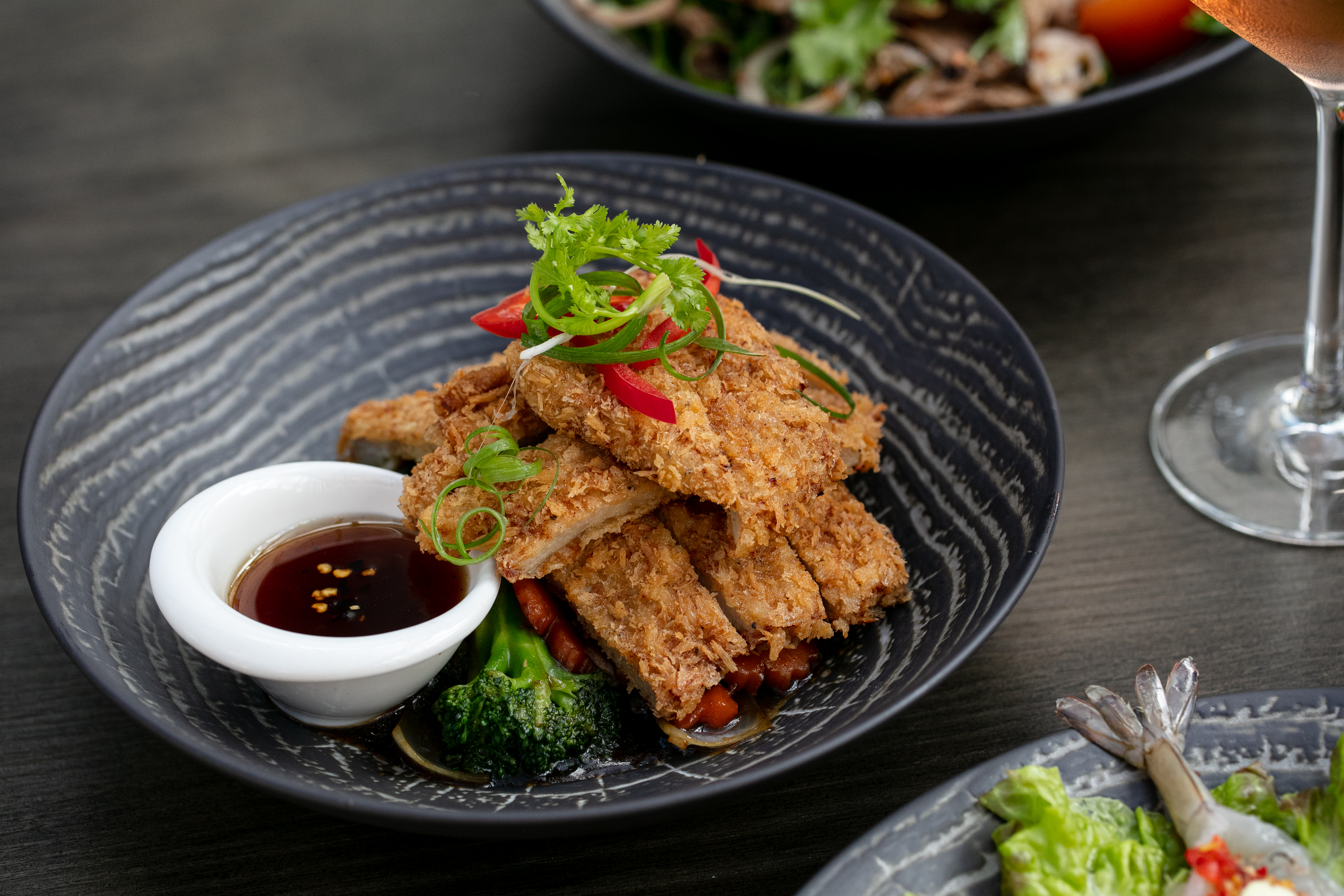 The pork is served with an array of tasty veges. Photo / Babiche Martens