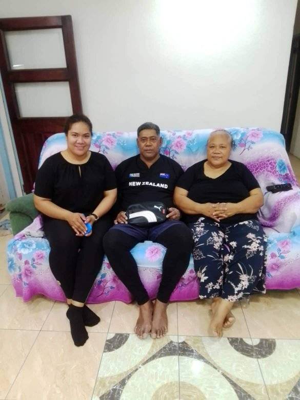 Folau Fakatava's parents, Luseane and Okusitino Fakatava, with his sister Vakisi'i at his parents' home in Tonga. Photo / Supplied
