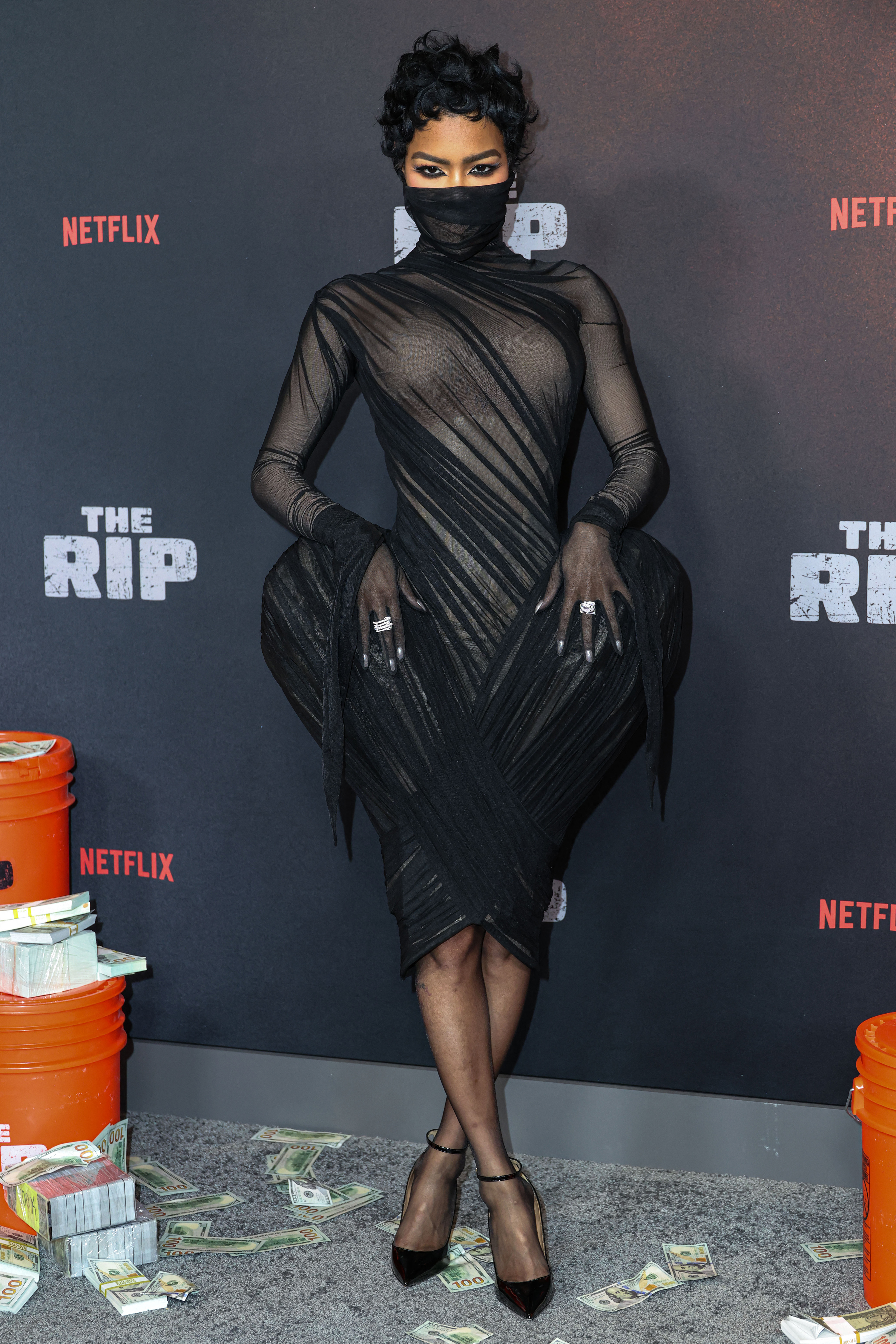 Teyana Taylor at the premiere of “The Rip” in an Ashi Studio dress with heart-shaped hip appendages. Photo / Image Press Agency / NurPhoto via AFP