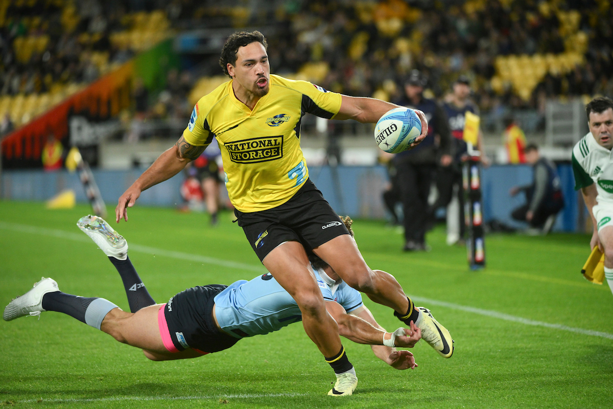 Billy Proctor of the Hurricanes scores a try during the side's win over the Waratahs. Photo / Photosport
