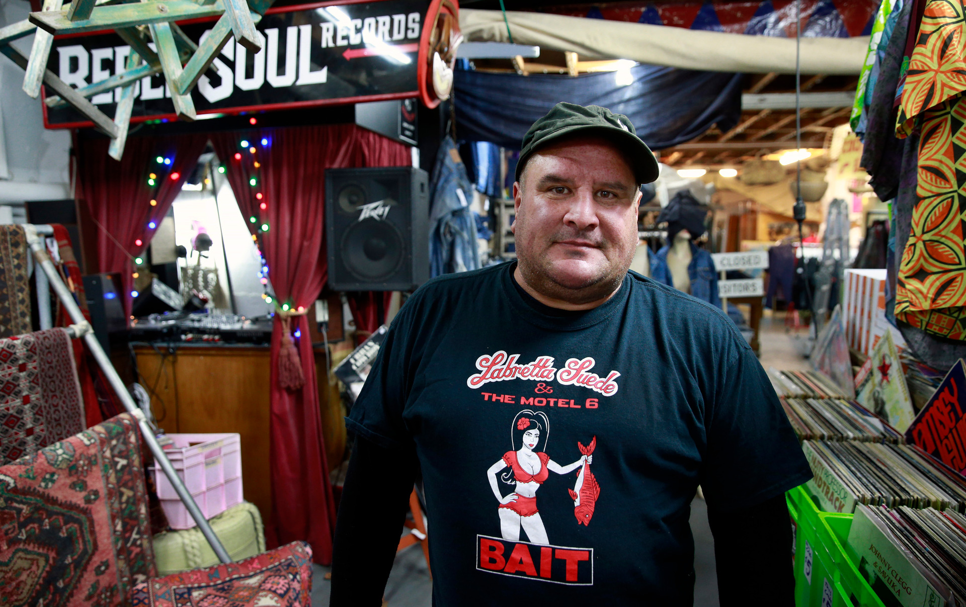 Tito Tafa in his record store; Rebel Soul Records at Cross st market in Auckland. Photo /  Alex Burton