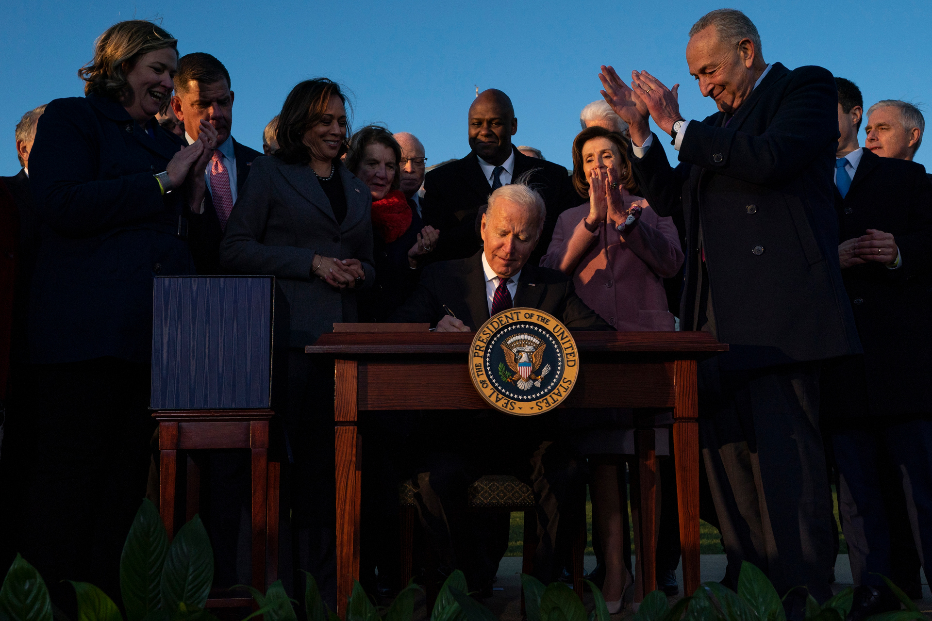 President Joe Biden signs the Infrastructure Investment and Jobs Act during an event on the South Lawn of the White House. Photo / AP