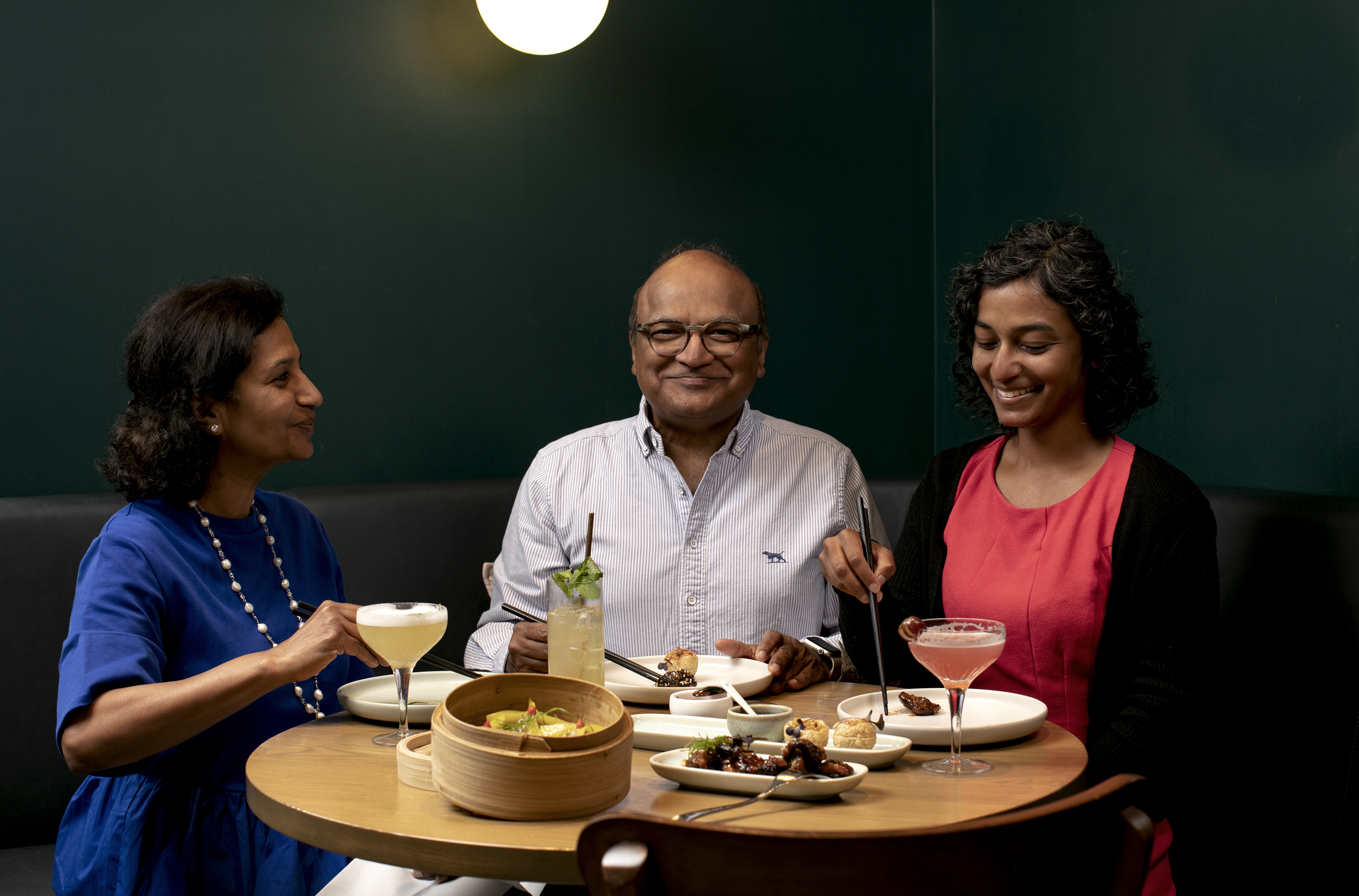 Owner of East restaurant Sudesh Jhunjhnuwala with his wife, Laxmi Jhunjhnuwala and their daughter. Photo / Babiche Martens