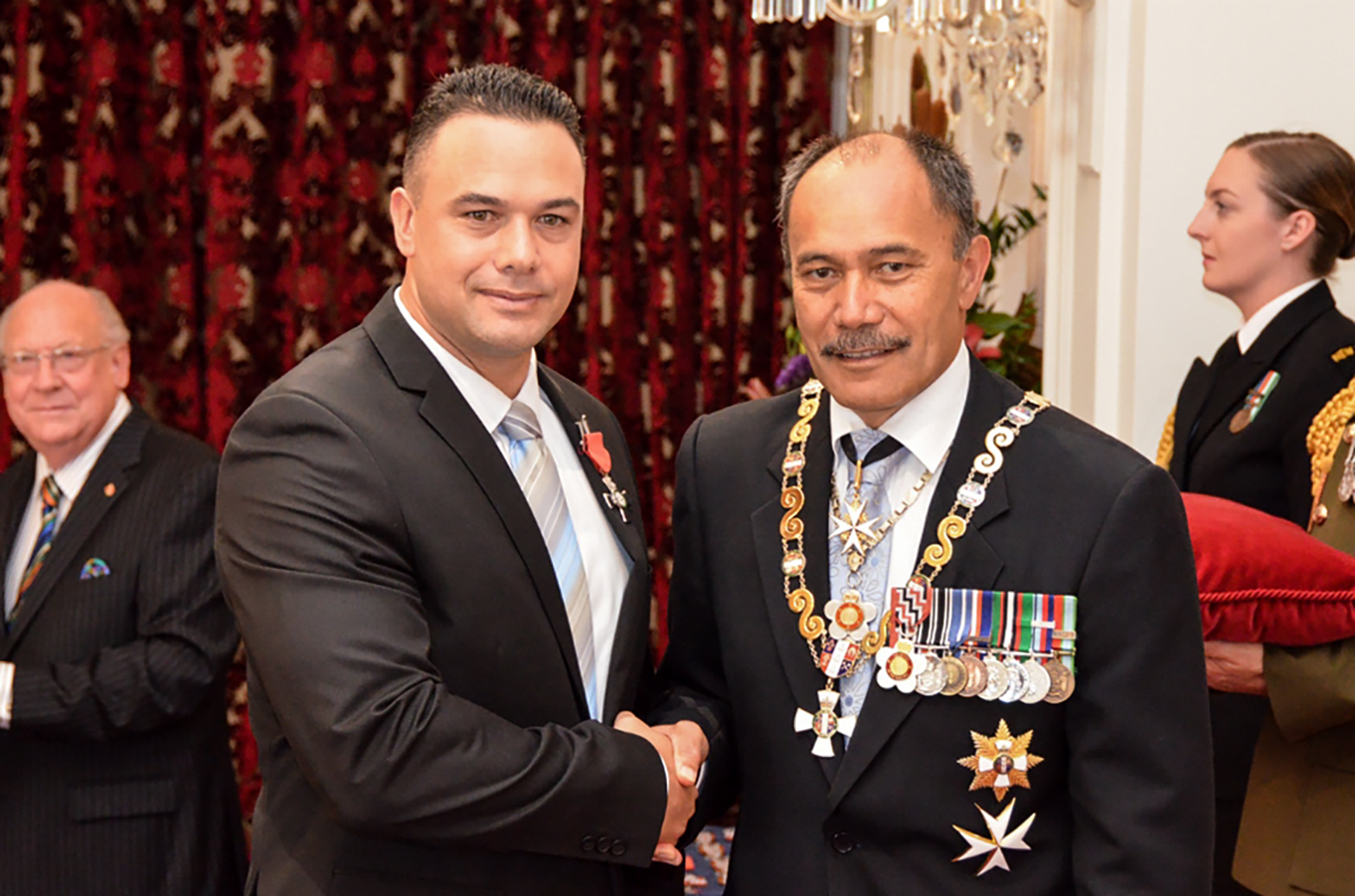 Stephen Boxer (left) shakes hands with former NZ governor-general Sir Jerry Mataparae at Government House in Wellington in 2014. Photo / Supplied