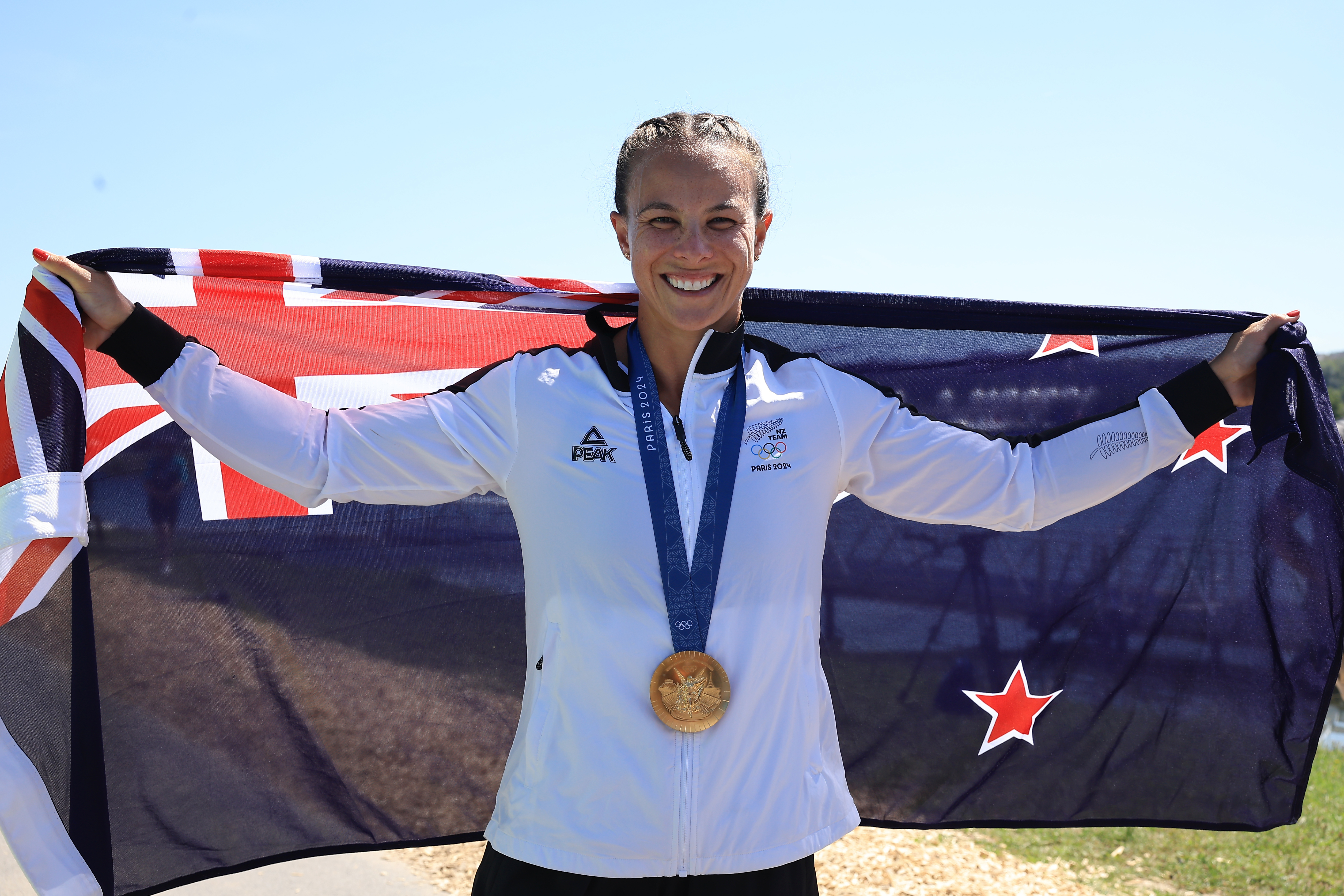 Dame Lisa Carrington celebrates her eighth Olympic gold medal. Photo / Photosport