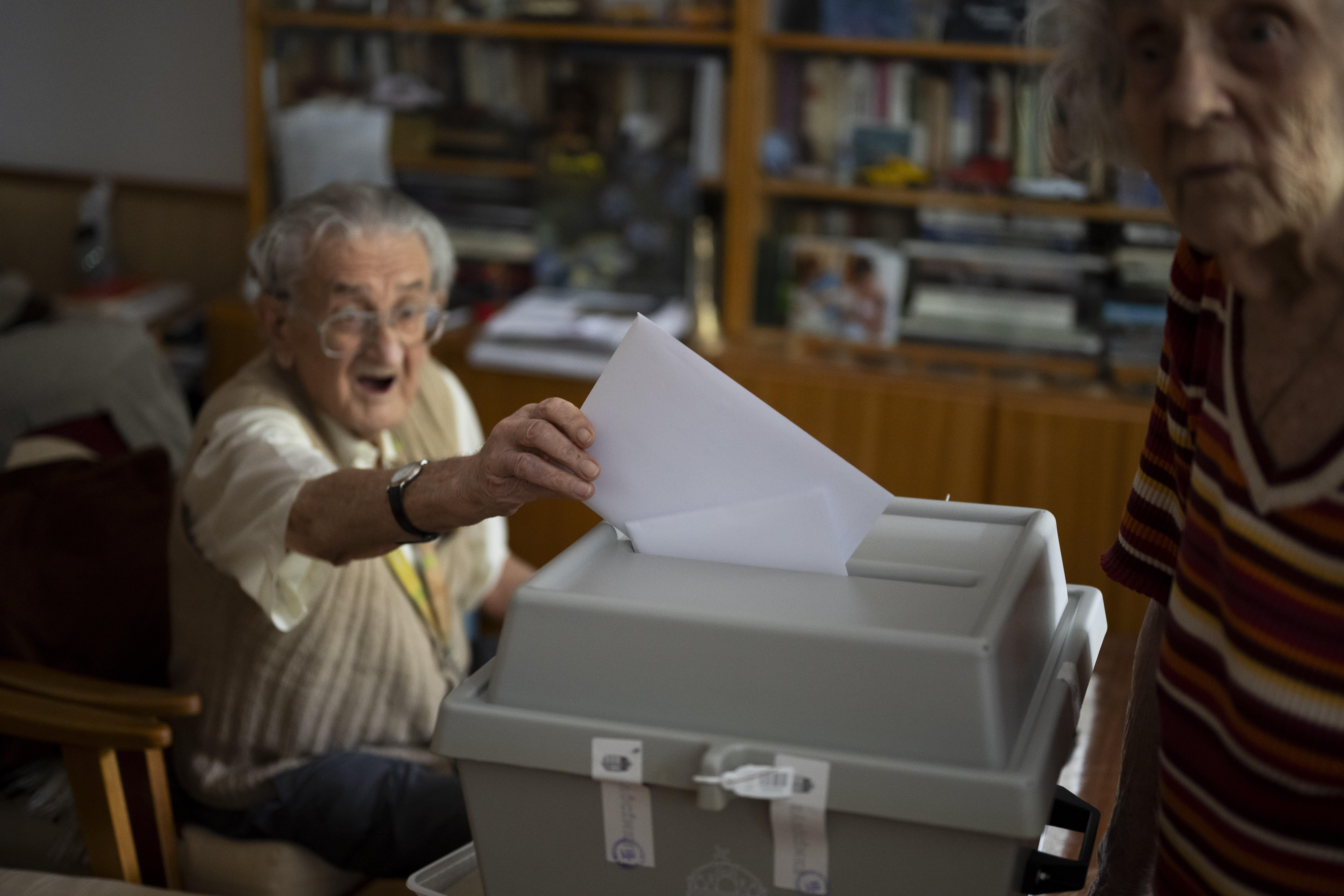 An elderly man casts his ballot in a mobile ballot box during European parliamentary elections in Budapest, Hungary. Photo / AP