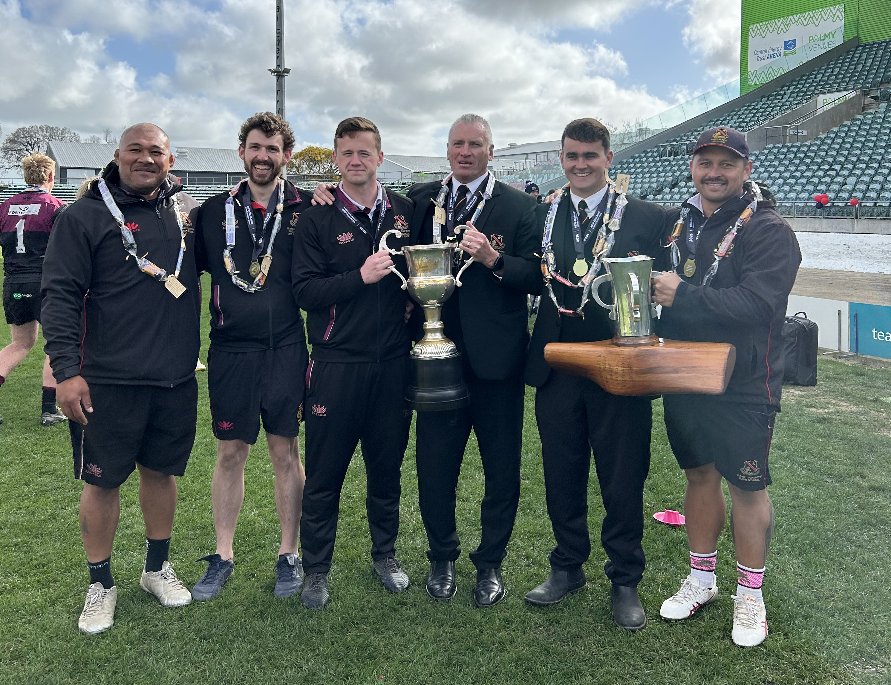 Hamilton Boys' High School team management with their trophies, Sona Taumalolo (left), Chris Pett, Te Raina Richards-Coxhead, Greg Kirkham, Cam Moorby and Jonnie Te Ruki-Chambers.