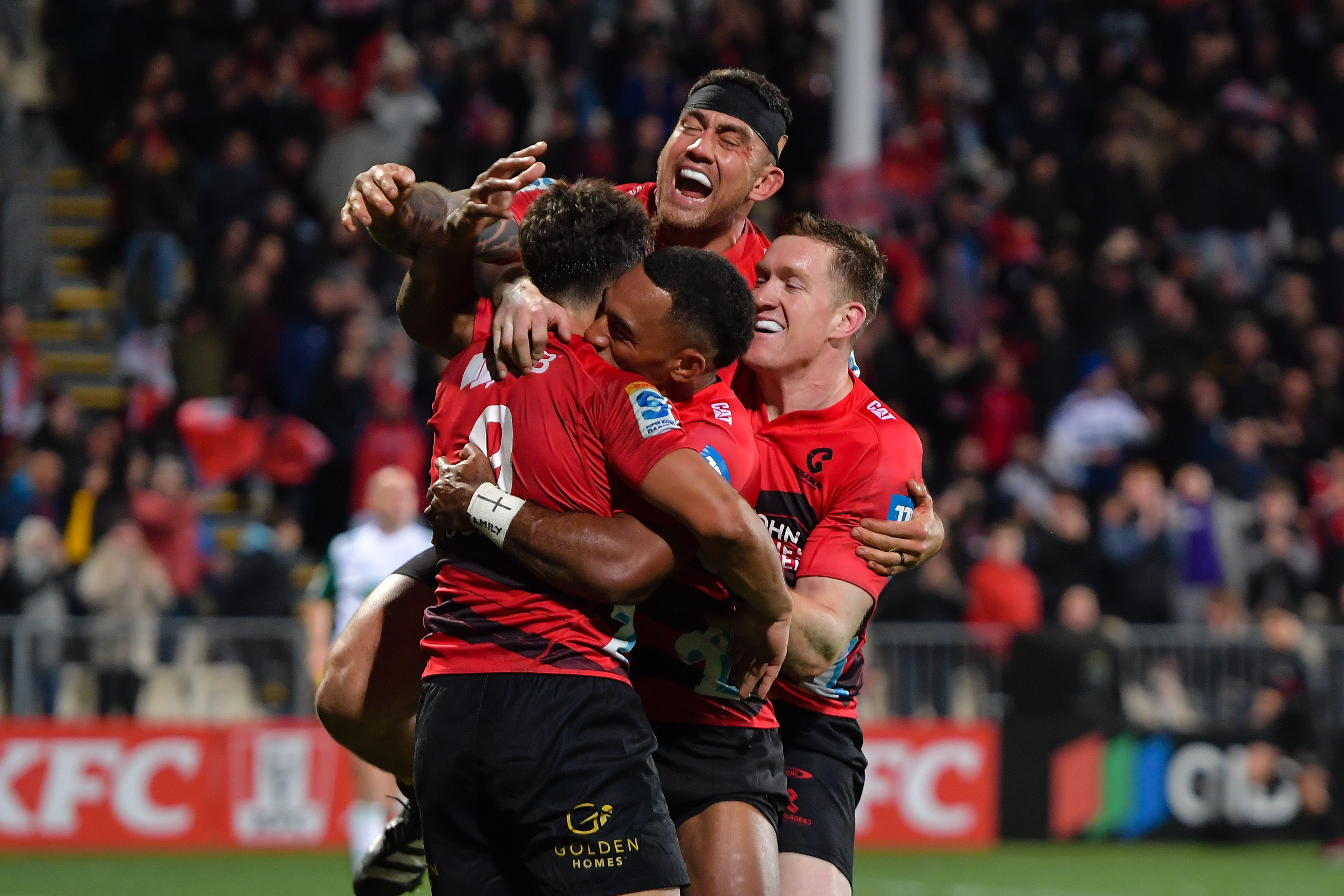 Noah Hotham celebrates his try with Codie Taylor, Sevu Reece and Dallas McLeod. Photo / Photosport