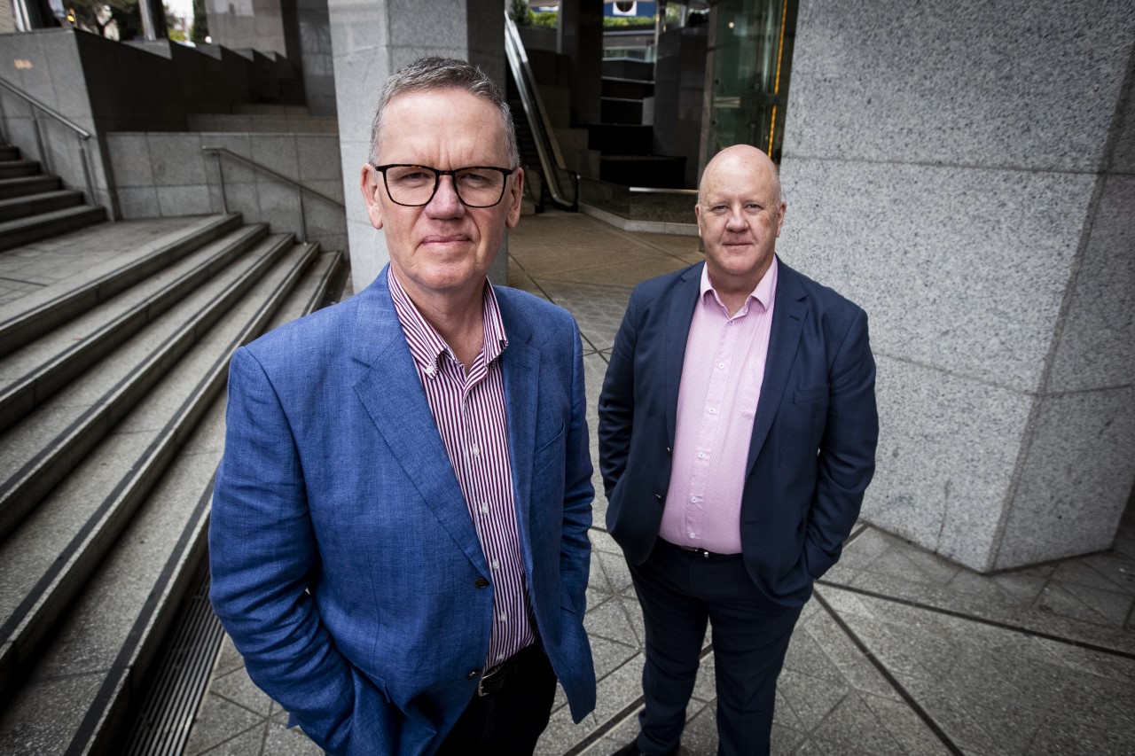 Auckland Council chief executive Jim Stabback, left, and governance director Phil Wilson, fronted the media on the damning Bush report into the January 27 floods. Photo / Jason Oxenham