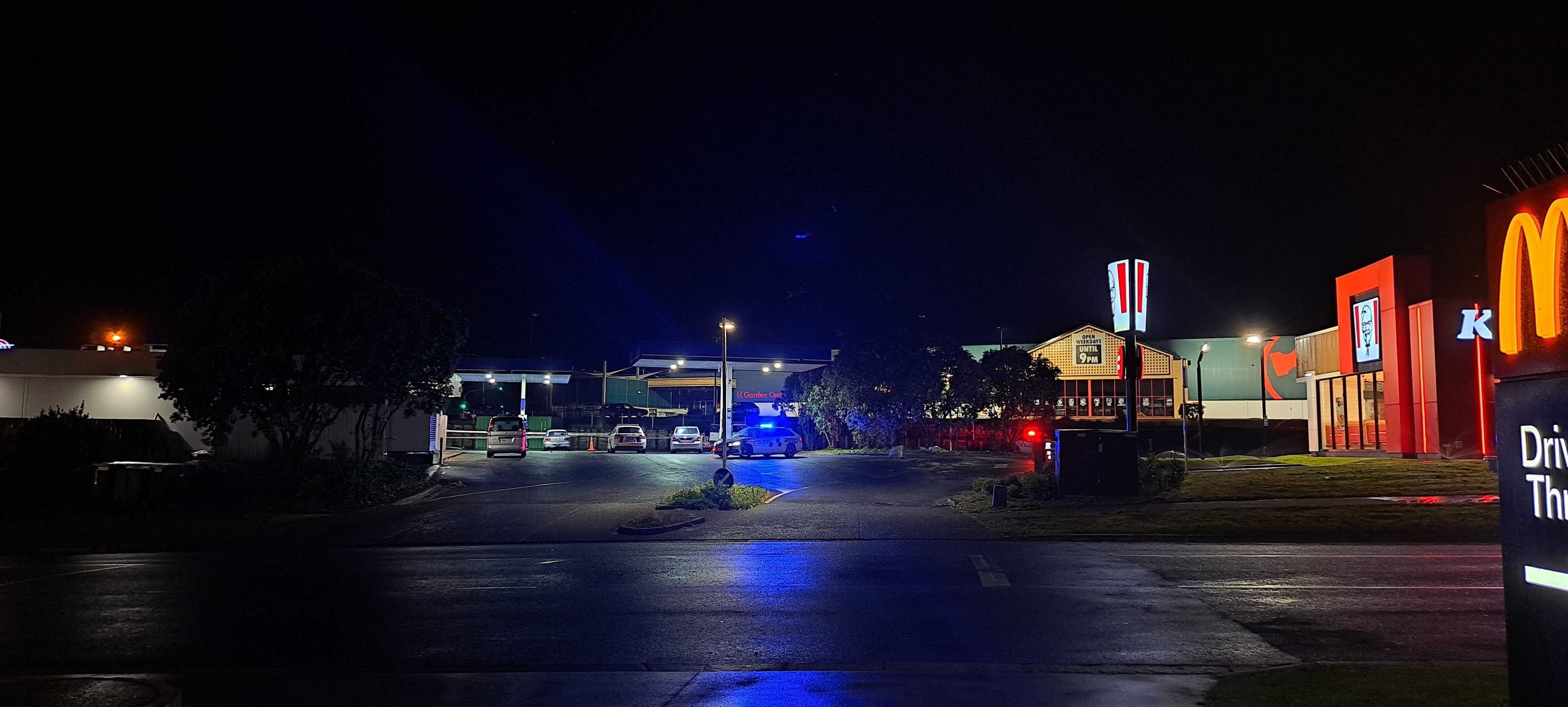 Police at the scene of a homicide investigation at Gull Raumanga in Whangarei. Photo / Brodie Stone