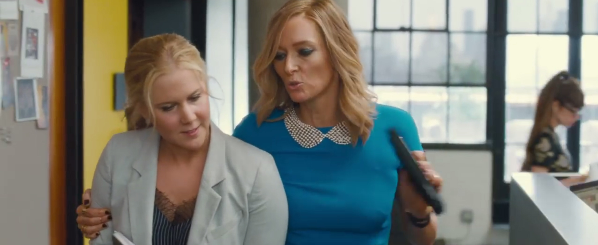 Amy Schumer and Tilda Swinton in a scene from the movie Trainwreck.