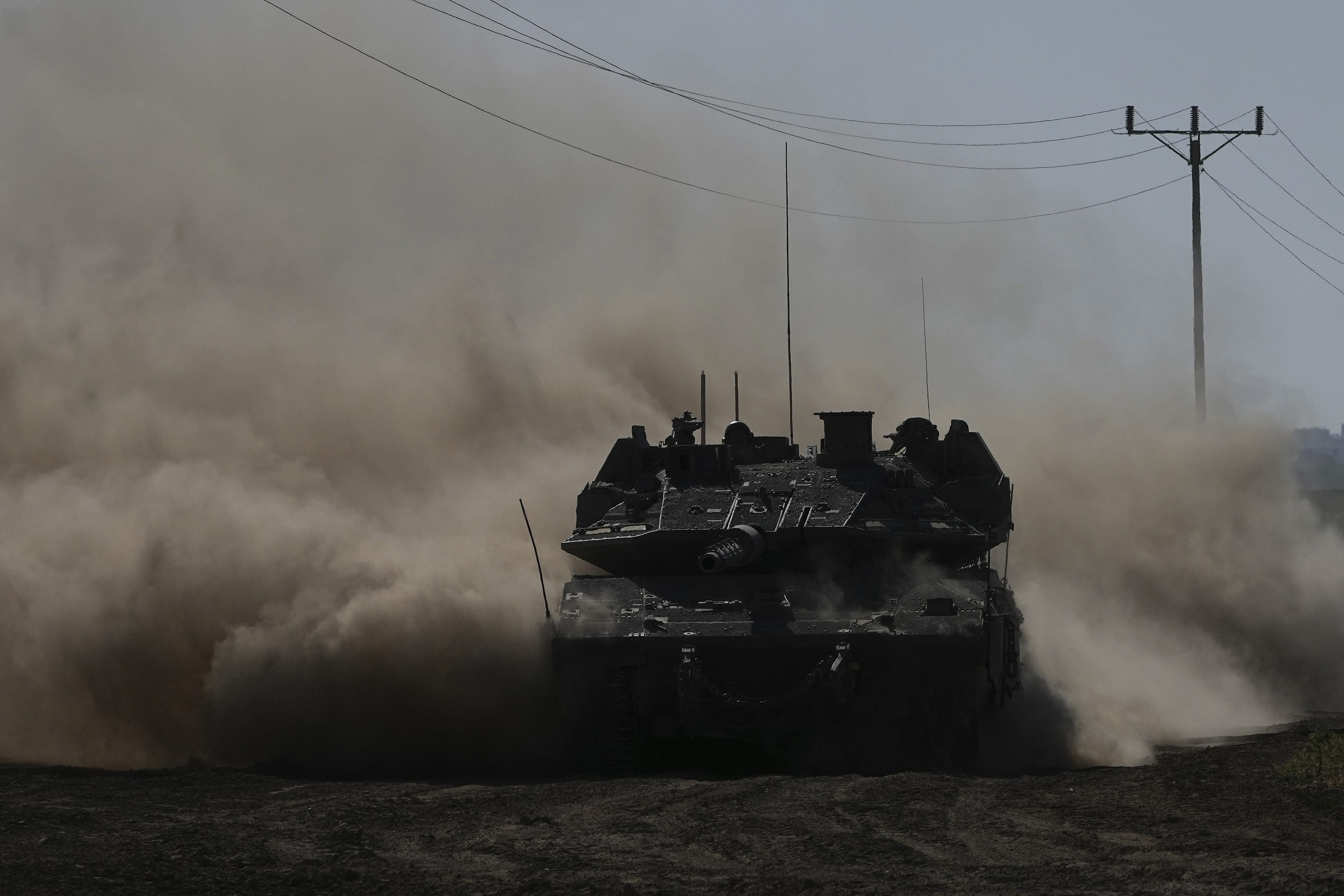 An Israeli tank moves near the Gaza Strip border in southern Israel. Photo / AP