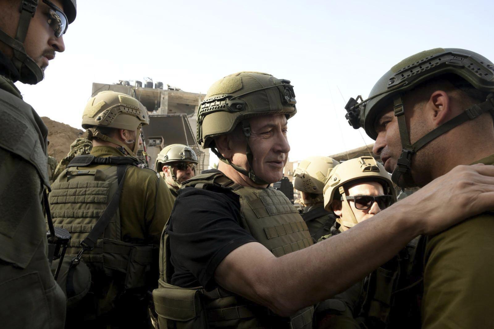 Israel's Prime Minister Benjamin Netanyahu greets IDF soldiers as he visits the Gaza Strip. Photo / AP