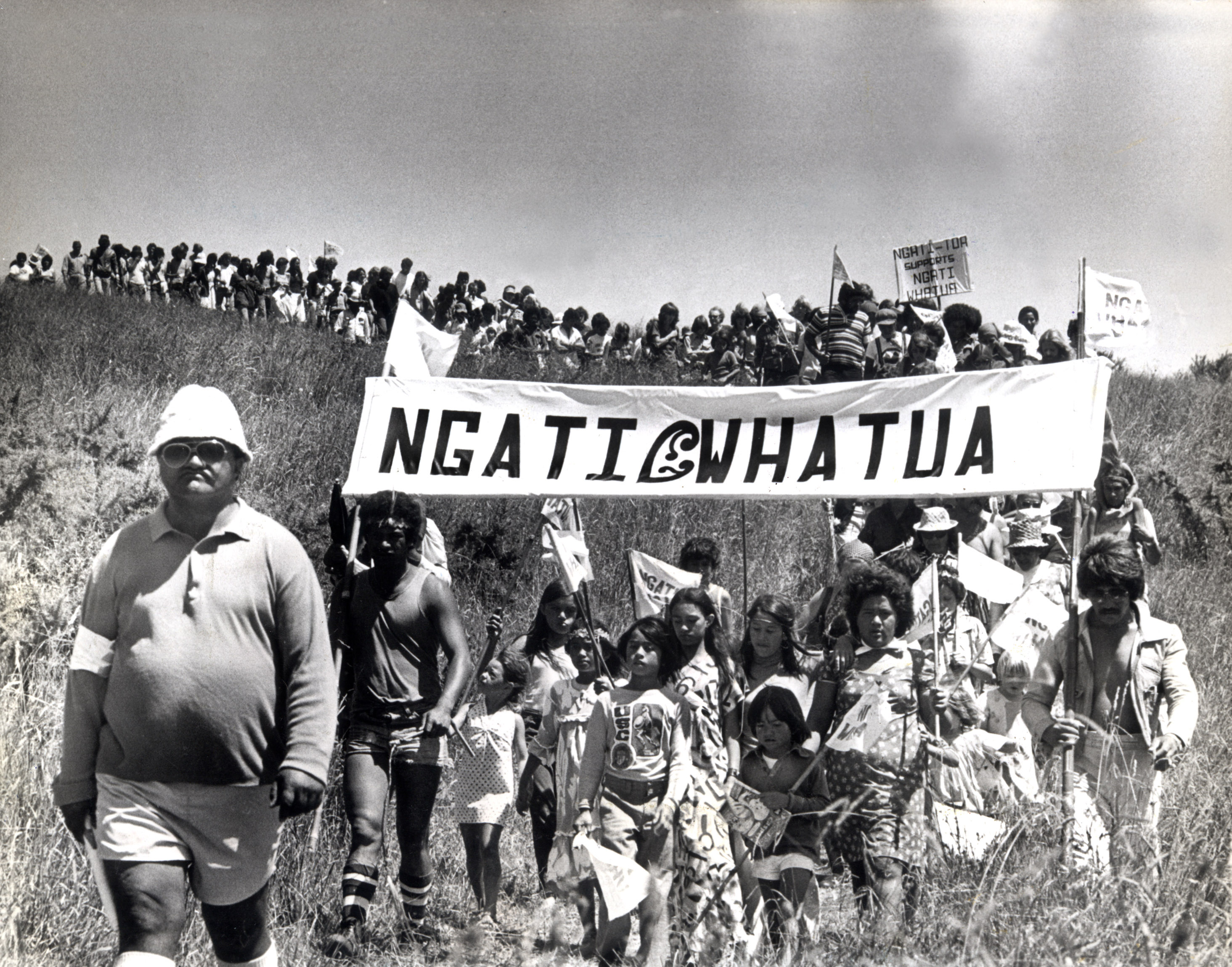 Ngāti Whātua protesters marching on the disputed land at Bastion Point on March 16, 1977.