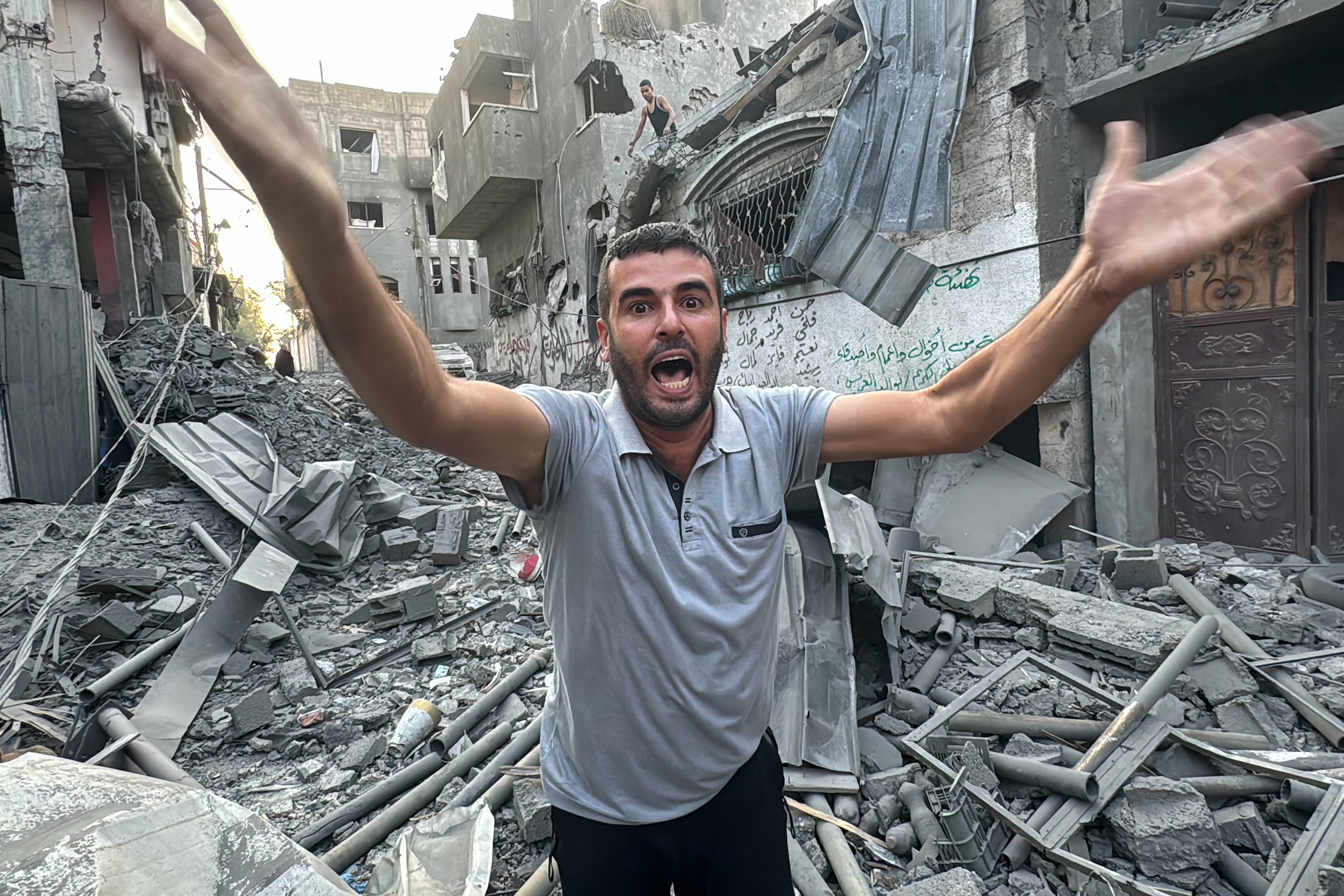 A survivor amid the rubble after an Israeli strike on the Jabalia refugee camp in the northern Gaza Strip. Photo / AFP