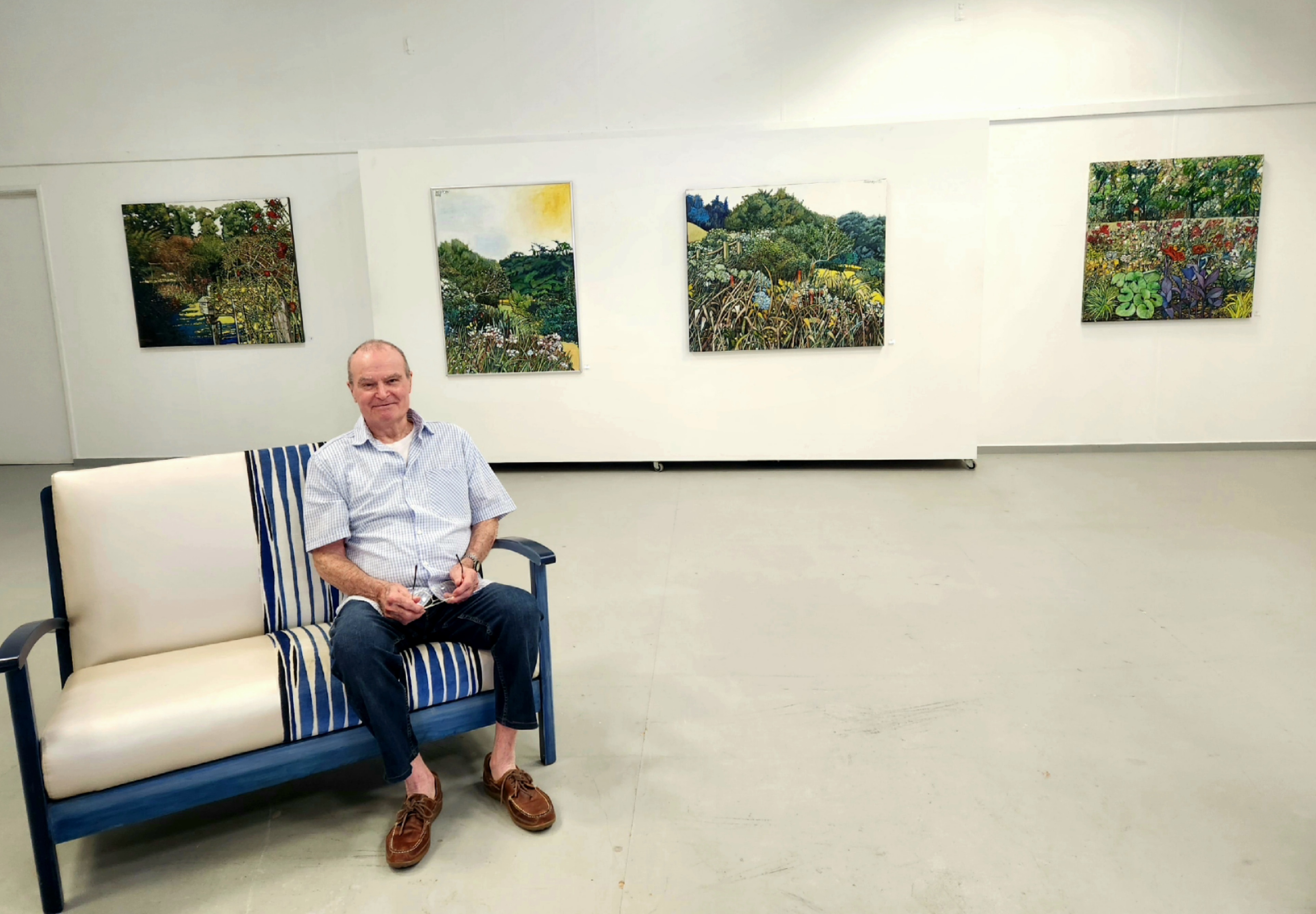 Artist Herb Foley with some of the 15 paintings he is exhibiting at Kings Theatre Creative in Kawakawa.